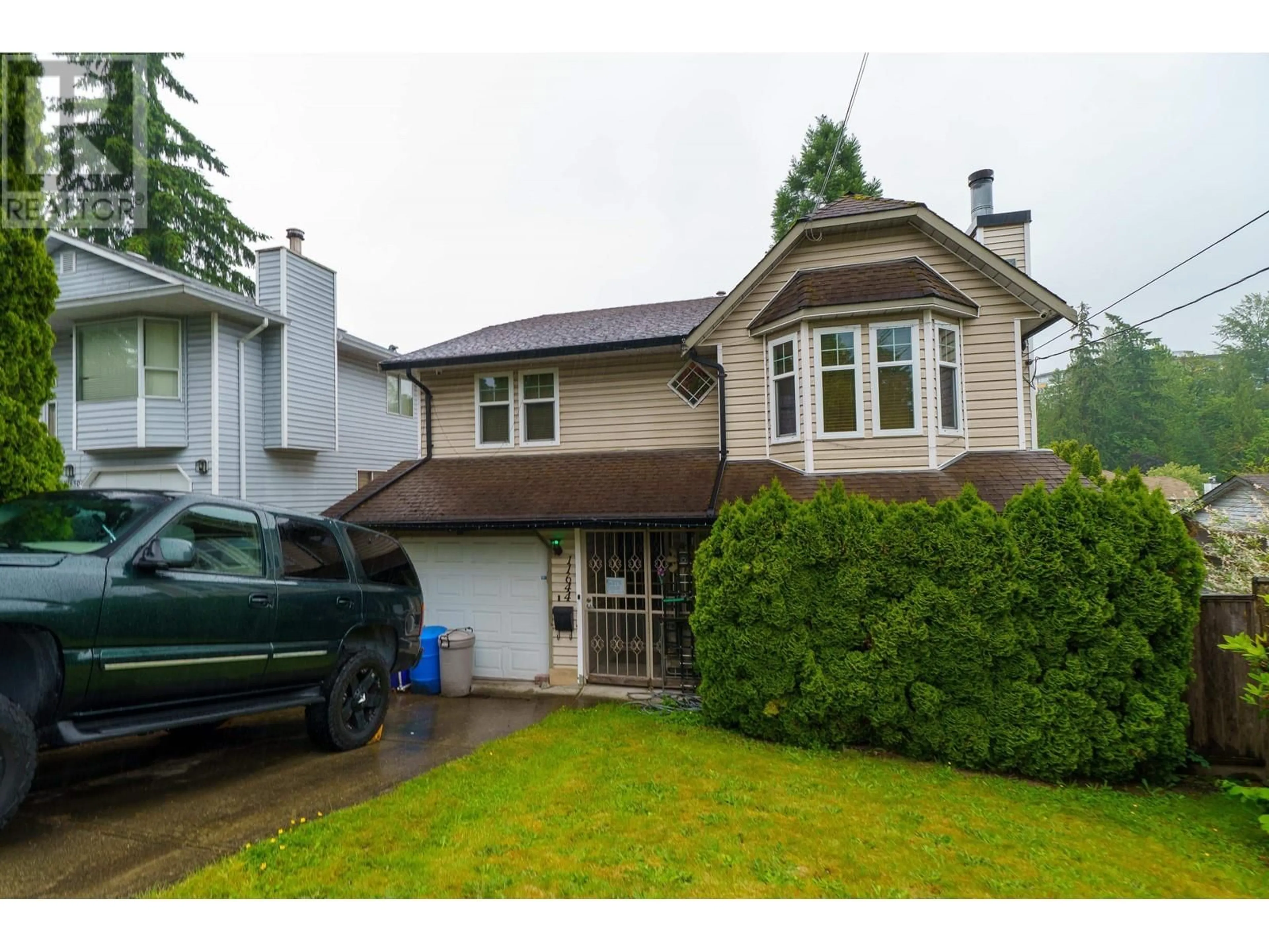 Home with vinyl exterior material, street for 11644 225 STREET, Maple Ridge British Columbia V2X6E4