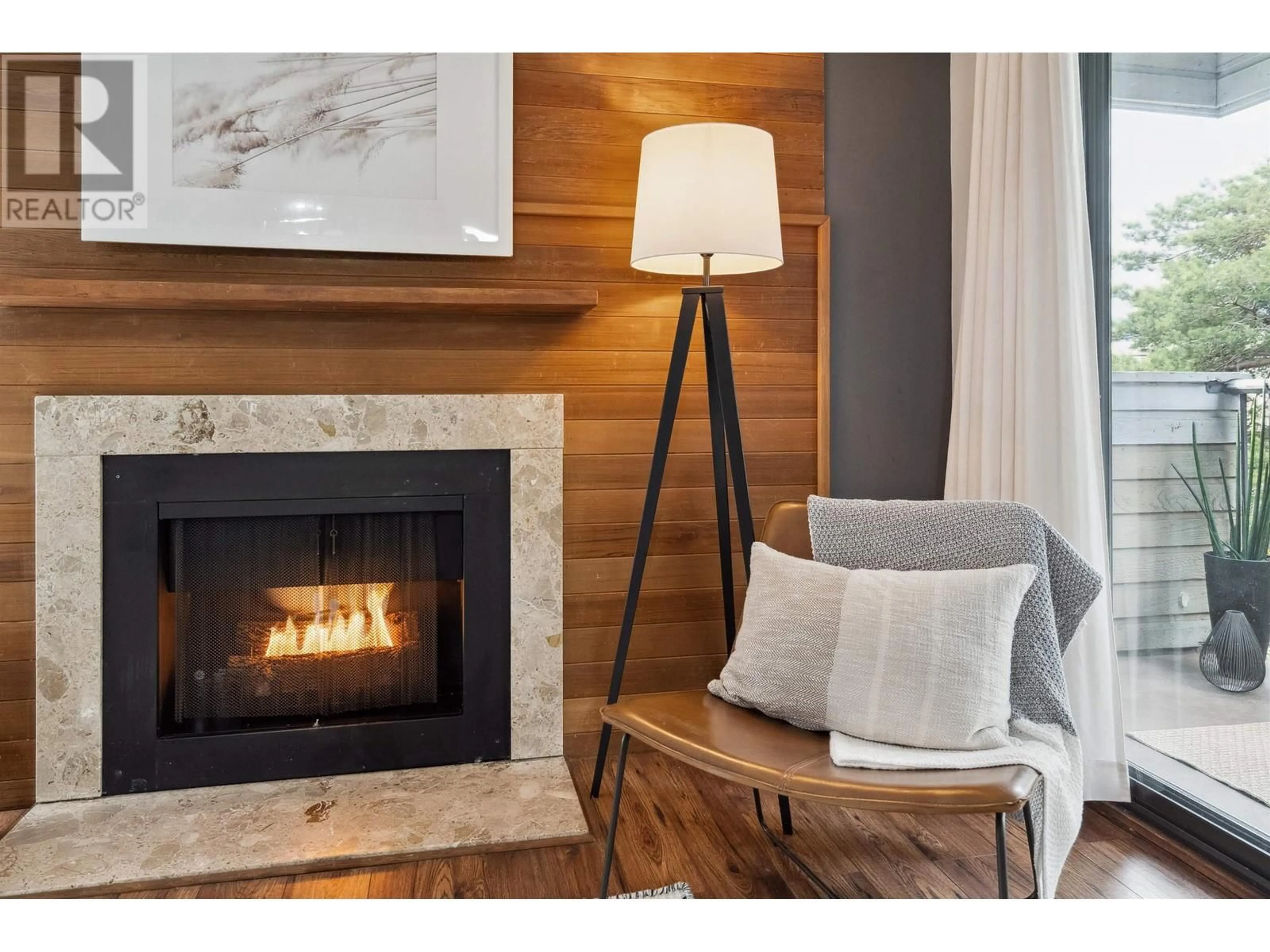 Living room with furniture, wood/laminate floor for 401 - 1717 HARO STREET, Vancouver British Columbia V6G1H1