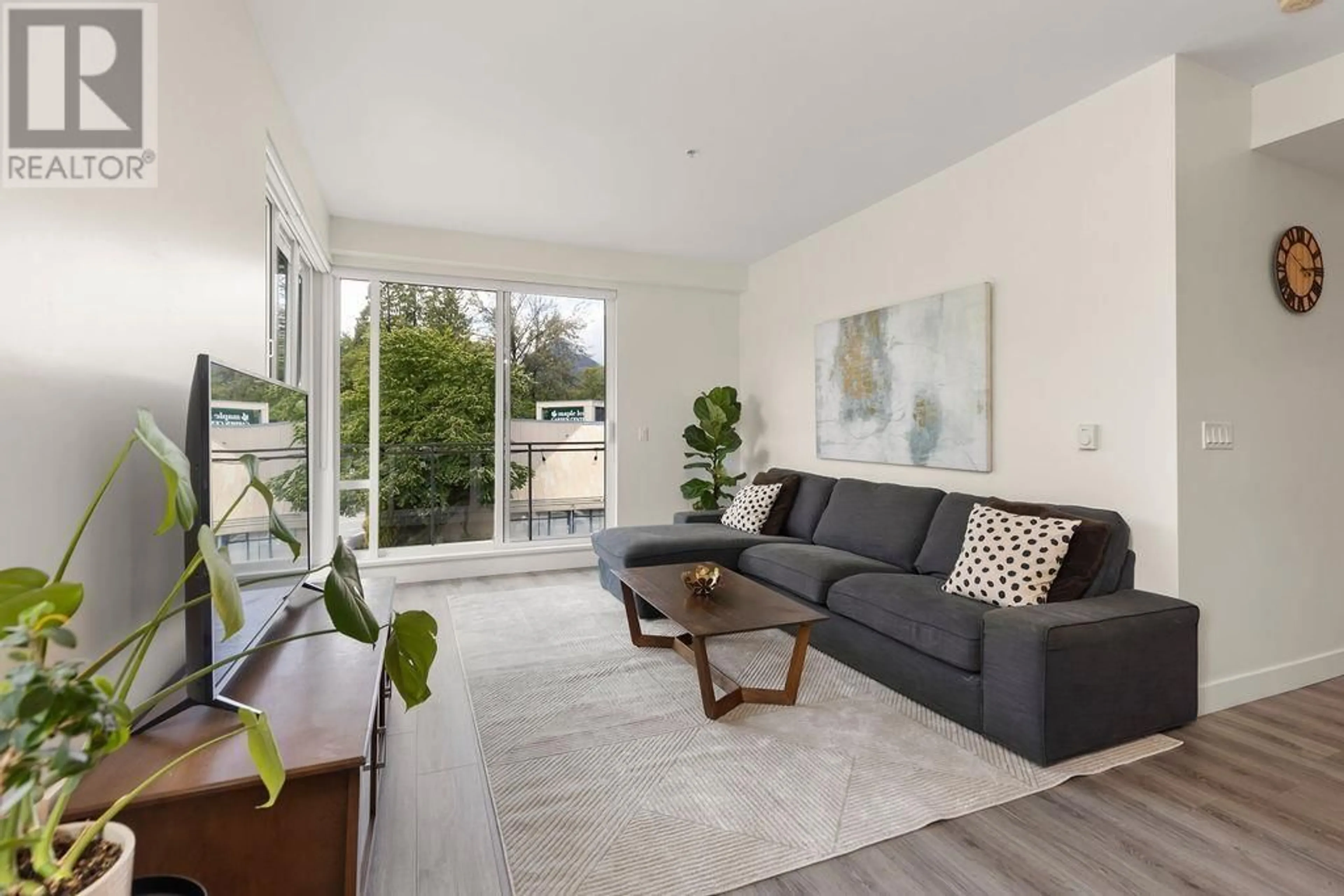Living room with furniture, unknown for 303 - 1327 DRAYCOTT ROAD, North Vancouver British Columbia V7J1W1