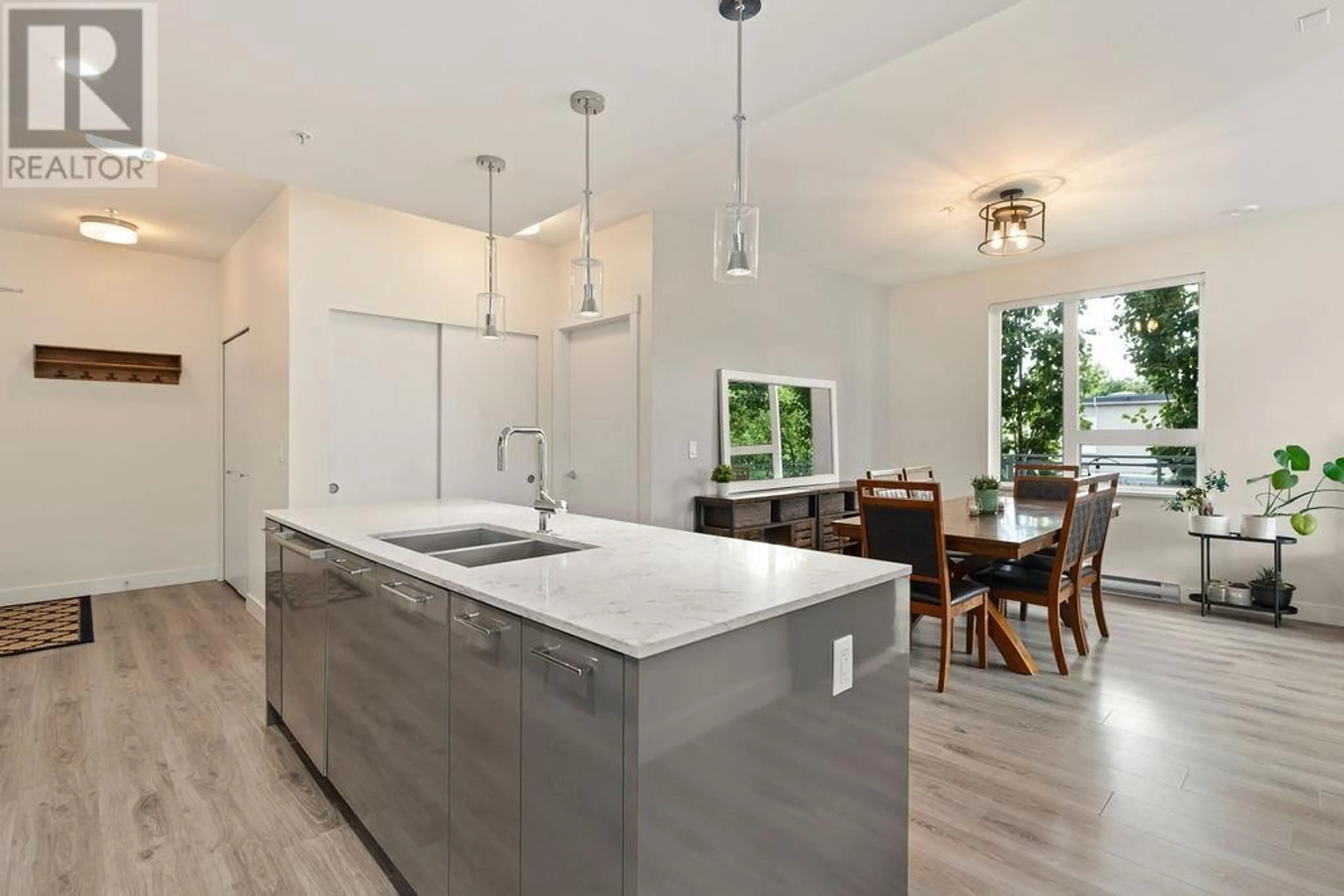 Open concept kitchen, unknown for 303 - 1327 DRAYCOTT ROAD, North Vancouver British Columbia V7J1W1