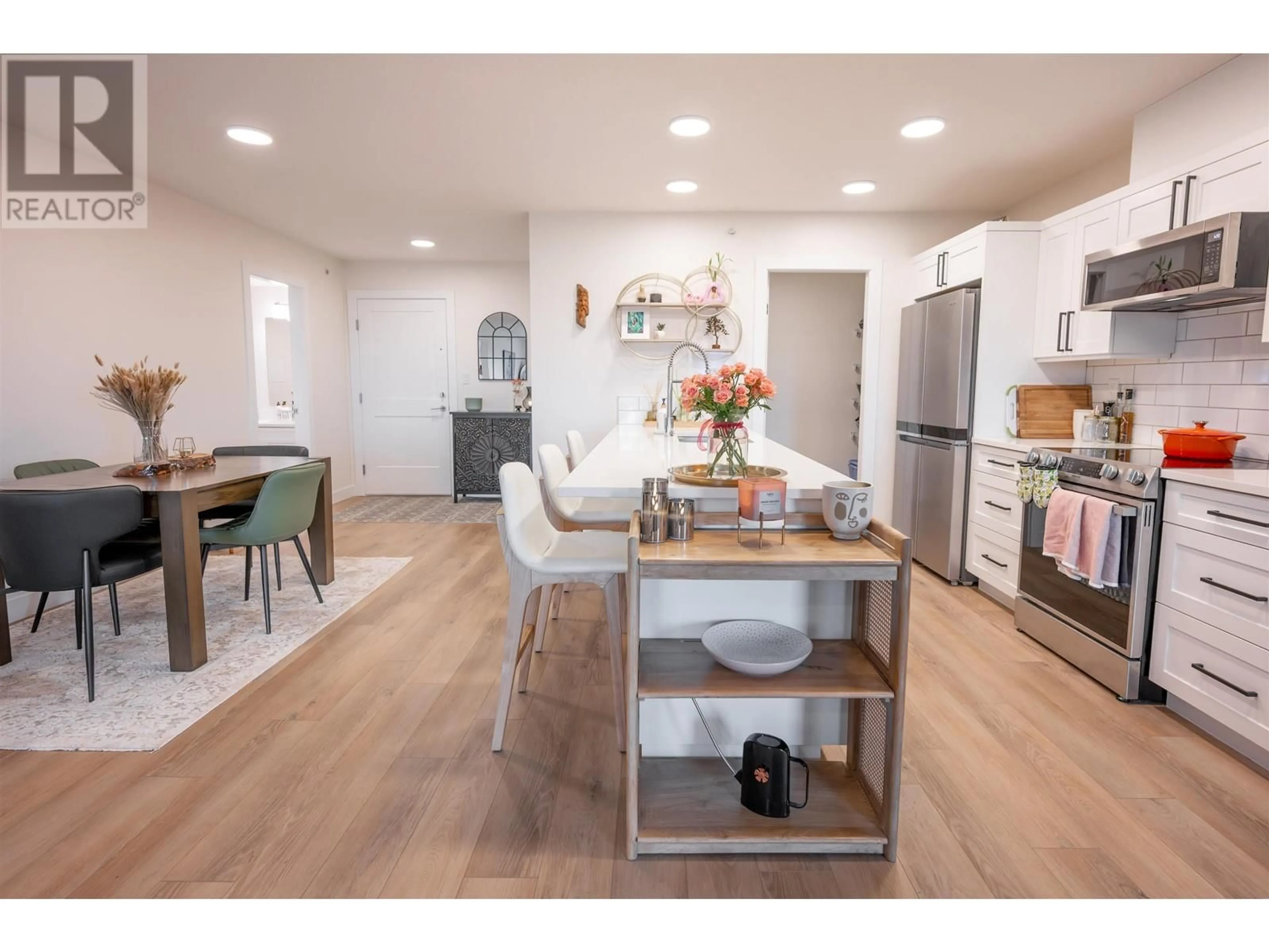 Open concept kitchen, wood/laminate floor for 404 - 4278 22ND AVENUE, Prince George British Columbia V2N0J4