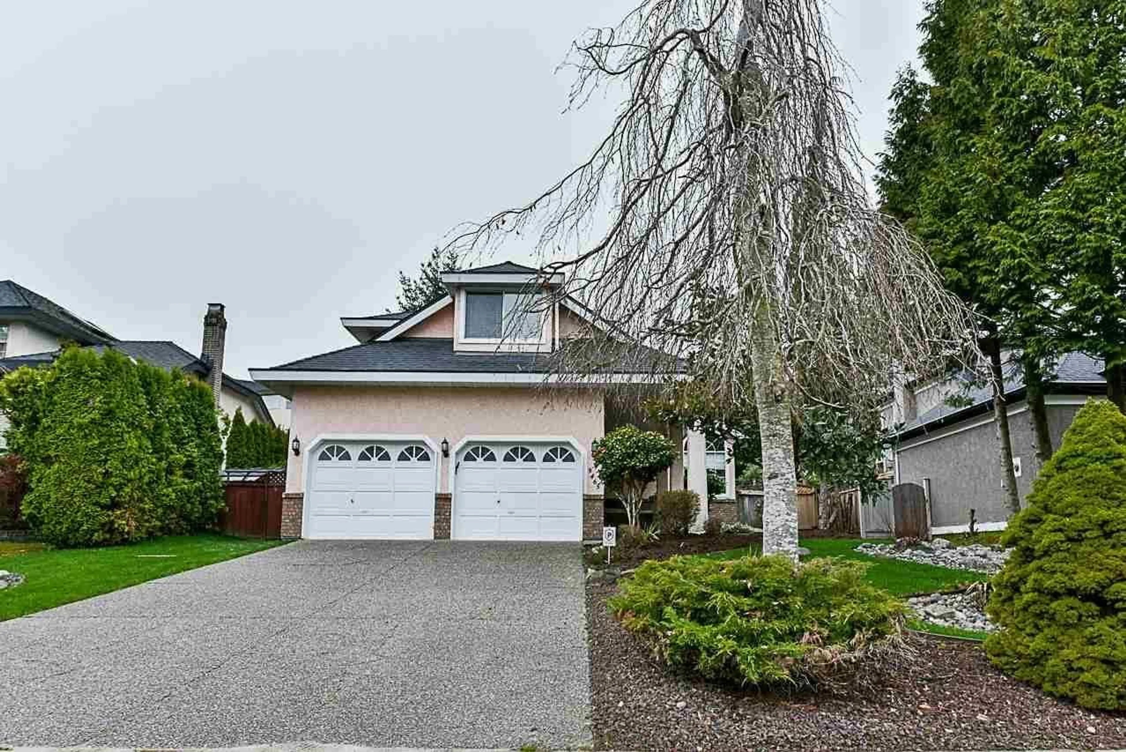 Home with vinyl exterior material, street for 9465 164, Surrey British Columbia V4N3C8