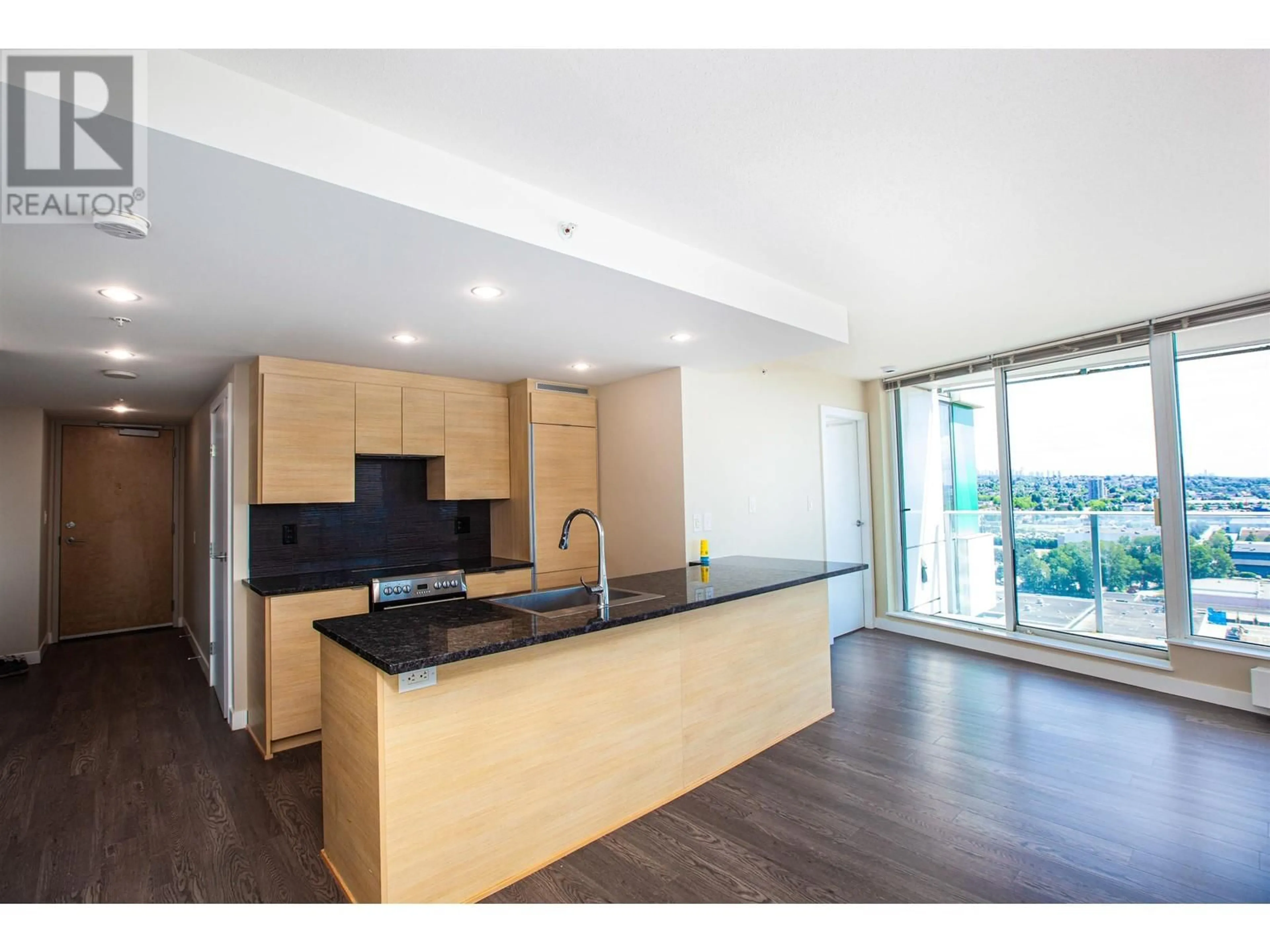 Open concept kitchen, wood/laminate floor for 1802 - 489 INTERURBAN WAY, Vancouver British Columbia V5X0C7