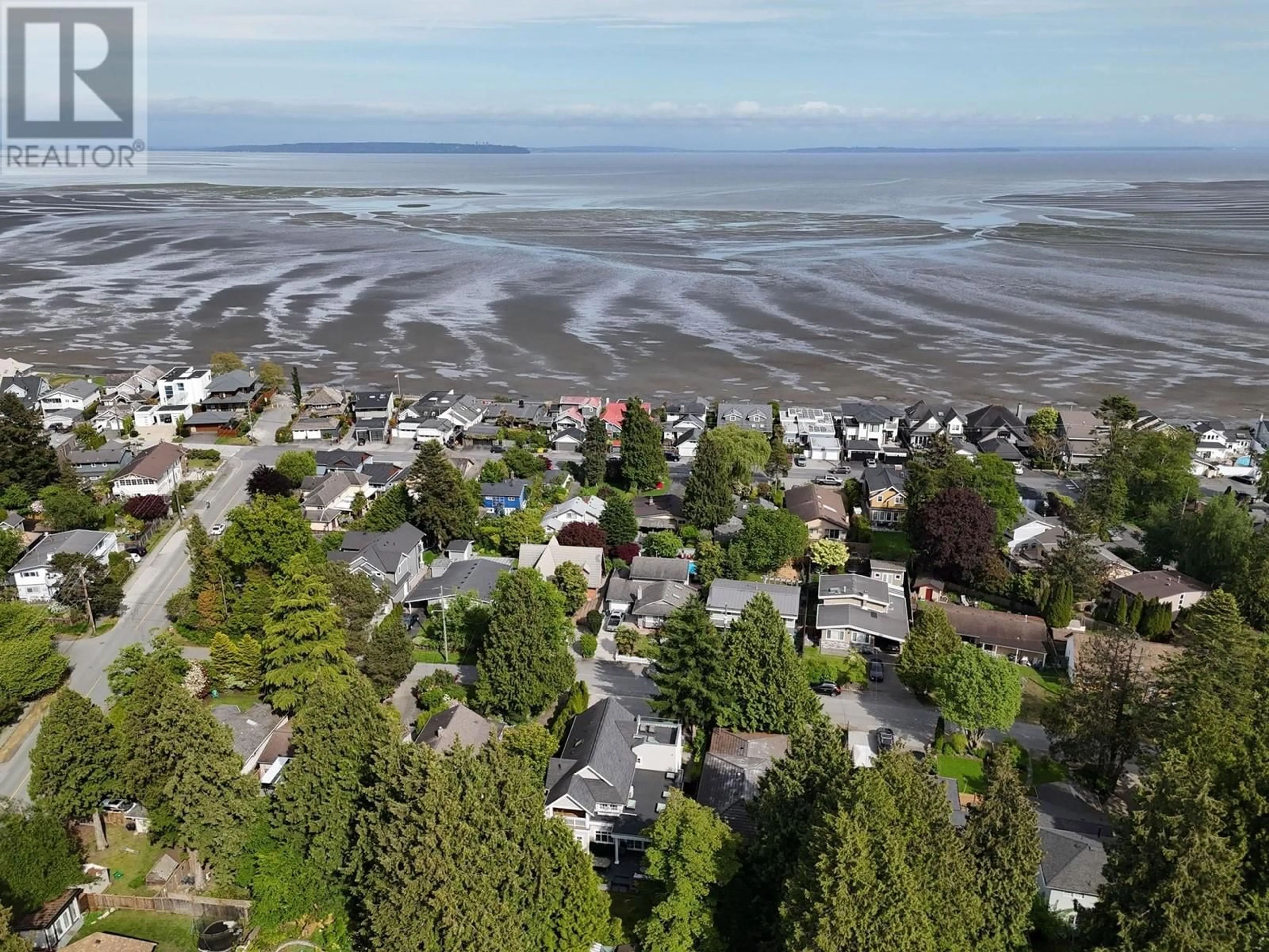 A pic from outside/outdoor area/front of a property/back of a property/a pic from drone, water/lake/river/ocean view for 1565 DUNCAN DRIVE, Delta British Columbia V4L1R7