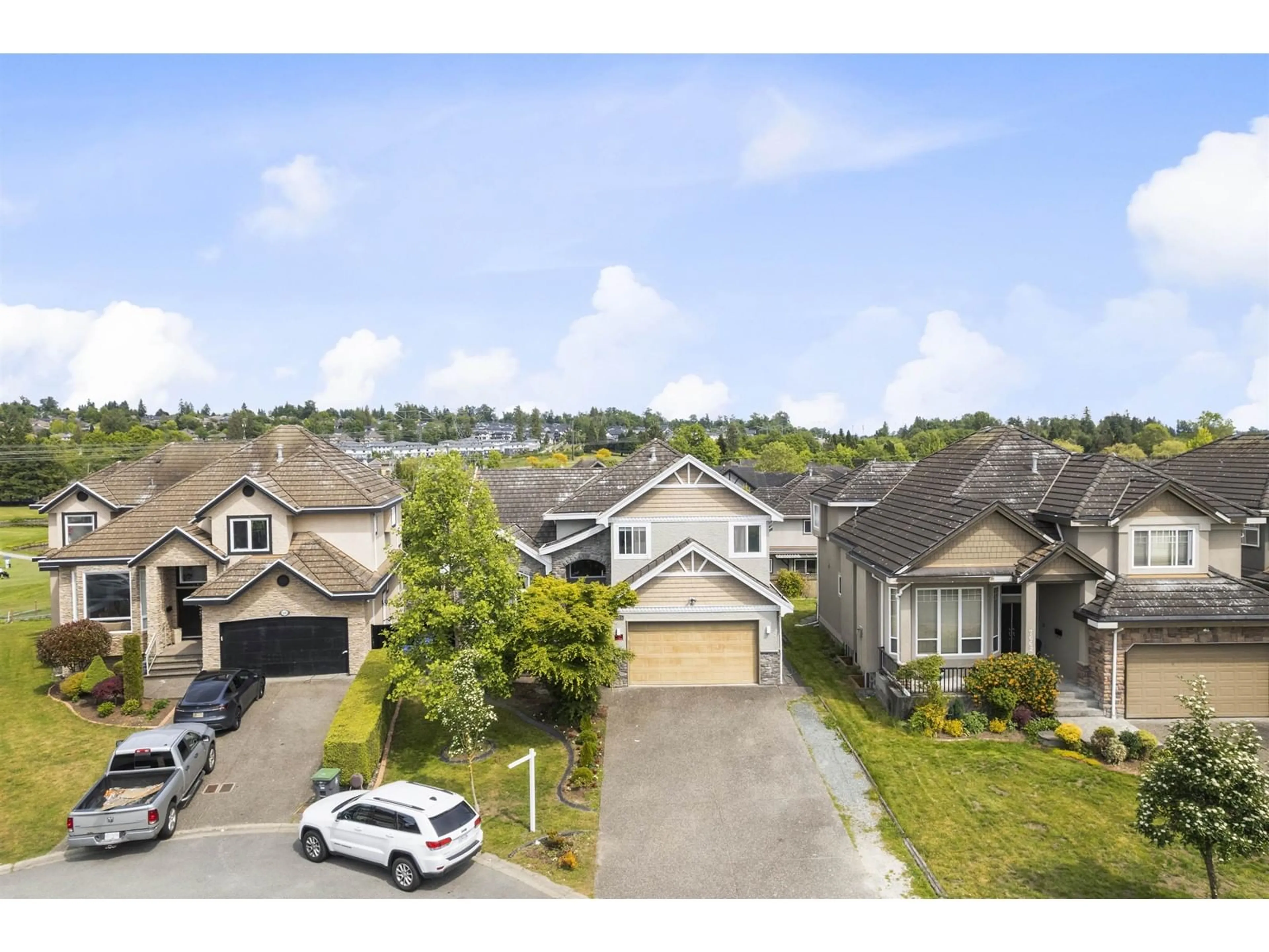 A pic from outside/outdoor area/front of a property/back of a property/a pic from drone, street for 7670 150B, Surrey British Columbia V3S5P1