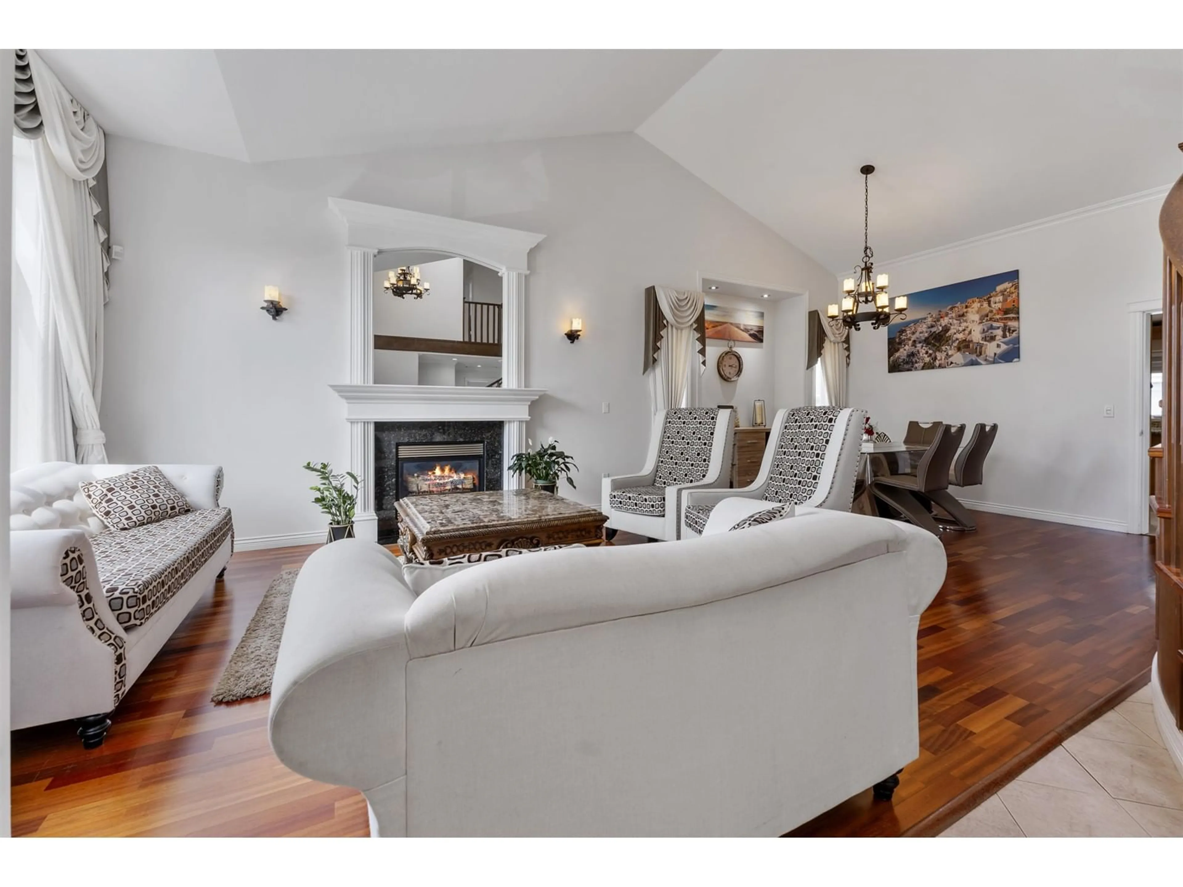 Living room with furniture, wood/laminate floor for 7670 150B, Surrey British Columbia V3S5P1