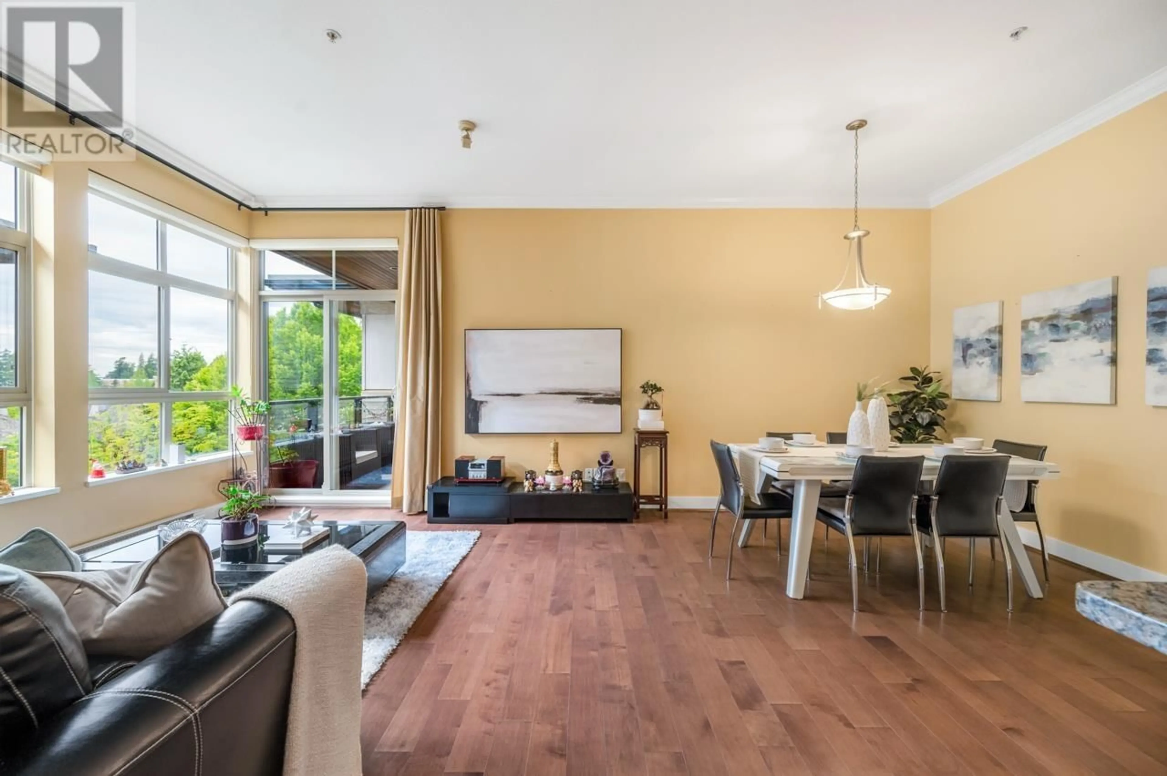 Living room with furniture, wood/laminate floor for 507 - 6333 LARKIN DRIVE, Vancouver British Columbia V6T0A7