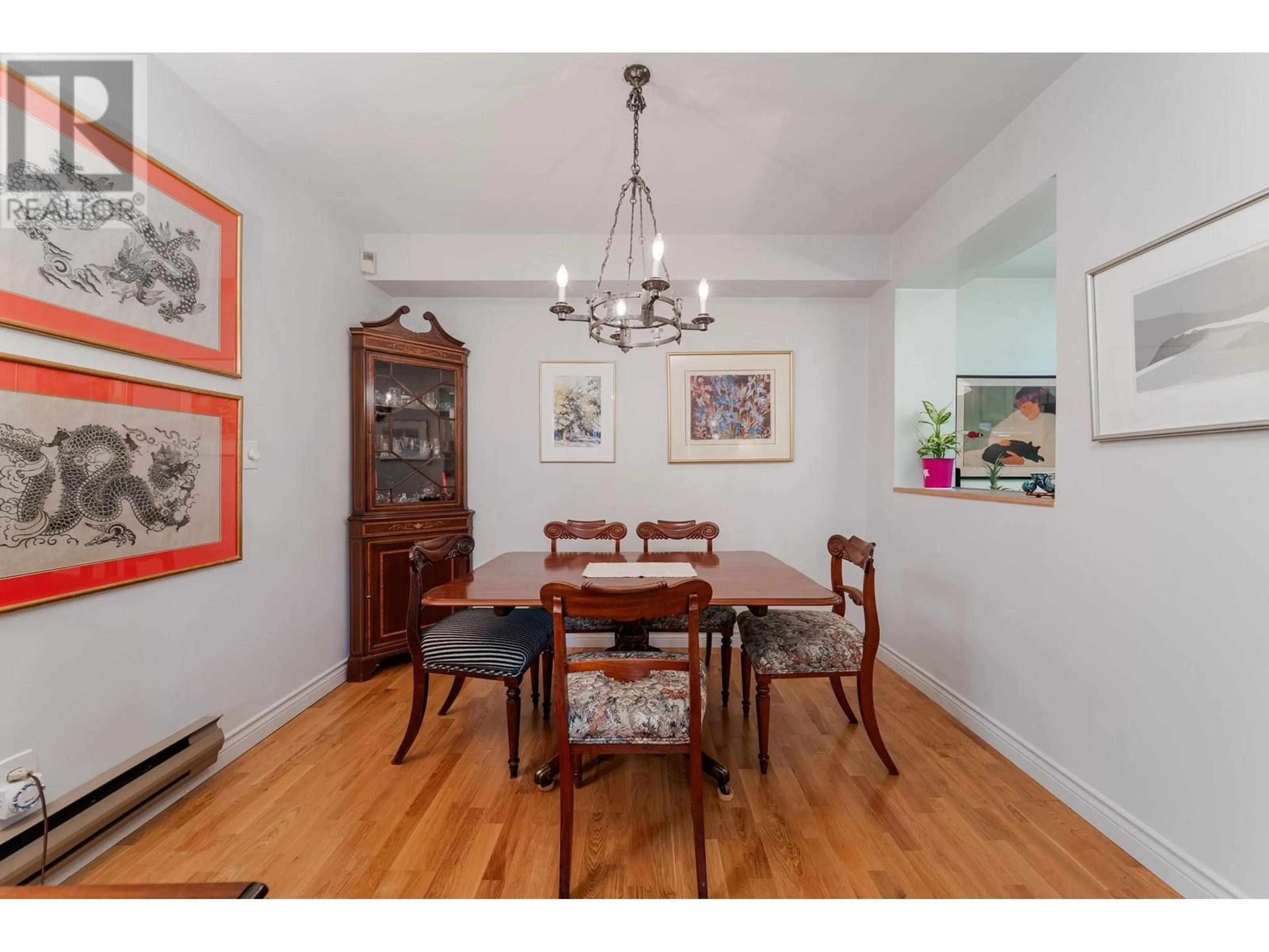 Dining room, wood/laminate floor for 2625 6TH AVENUE, Vancouver British Columbia V6K1W6