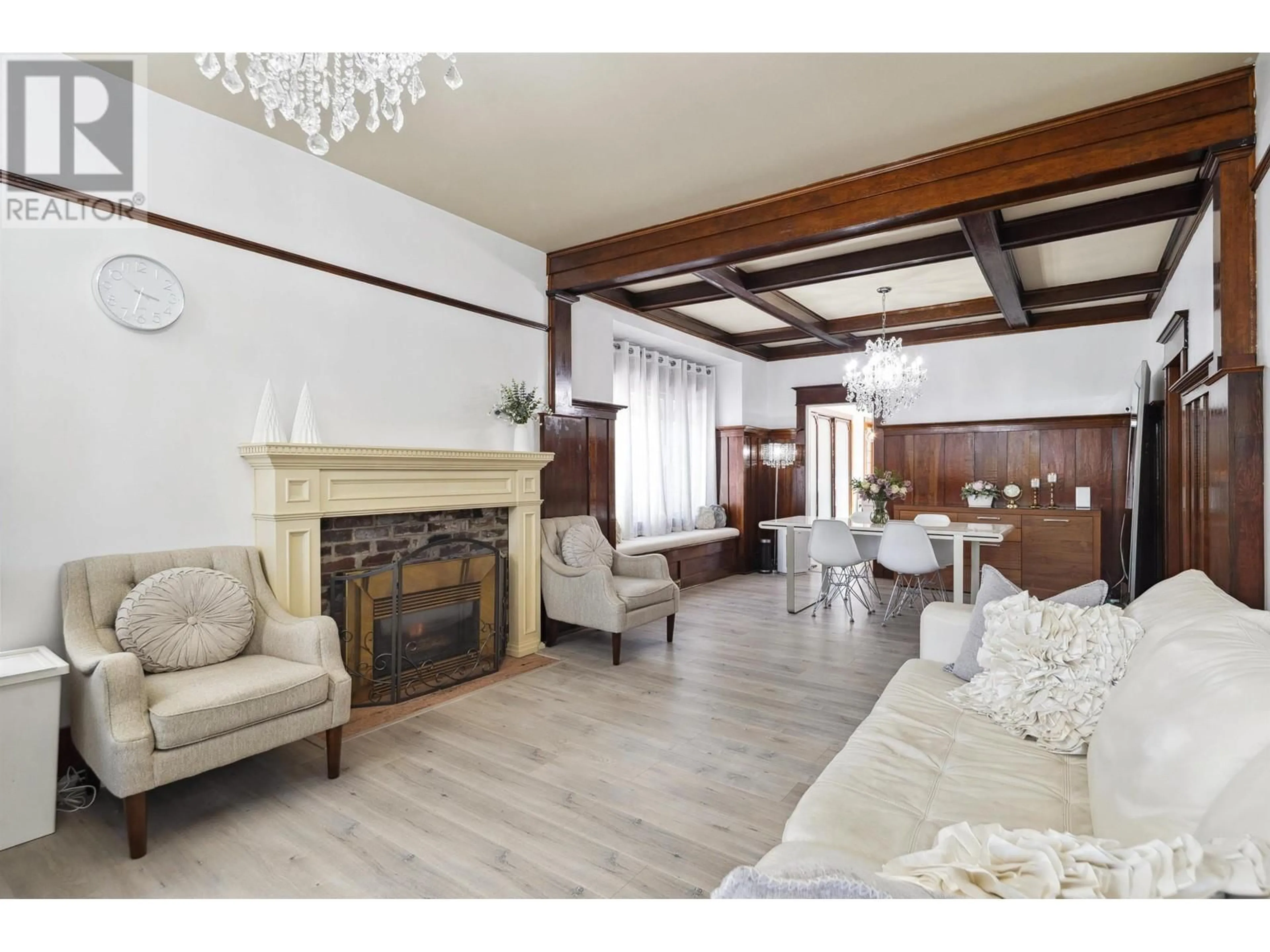 Living room with furniture, wood/laminate floor for 4190 11TH AVENUE, Vancouver British Columbia V6R2L6