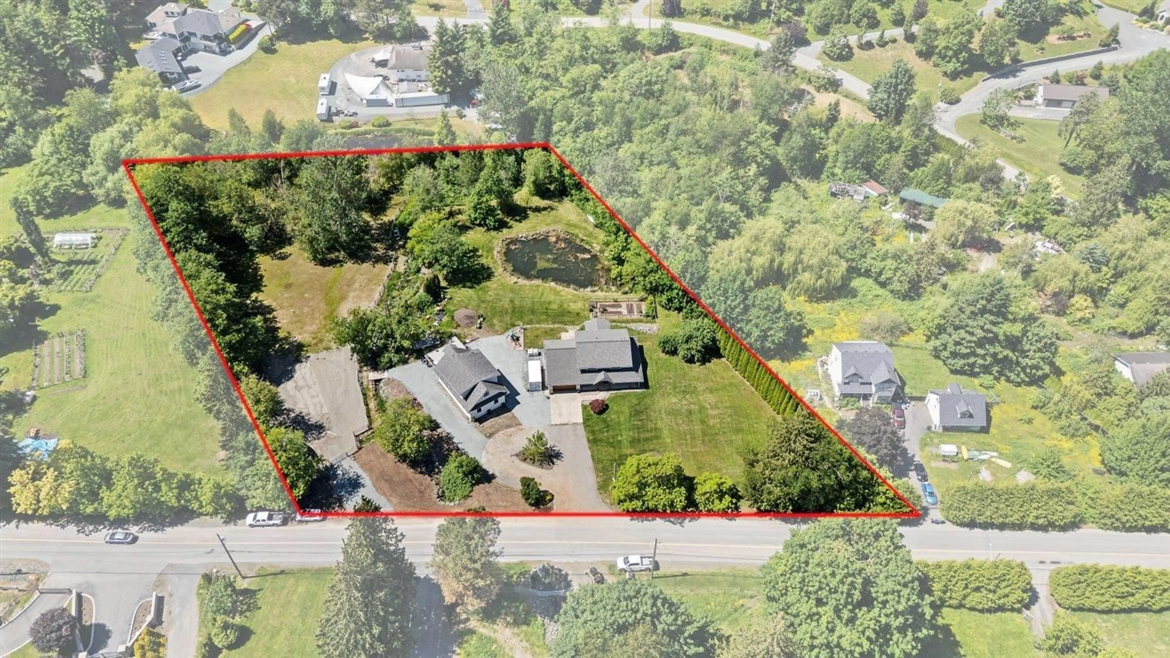A pic from outside/outdoor area/front of a property/back of a property/a pic from drone, street for 42115 MAJUBA HILL ROAD, Yarrow British Columbia V2R5H2