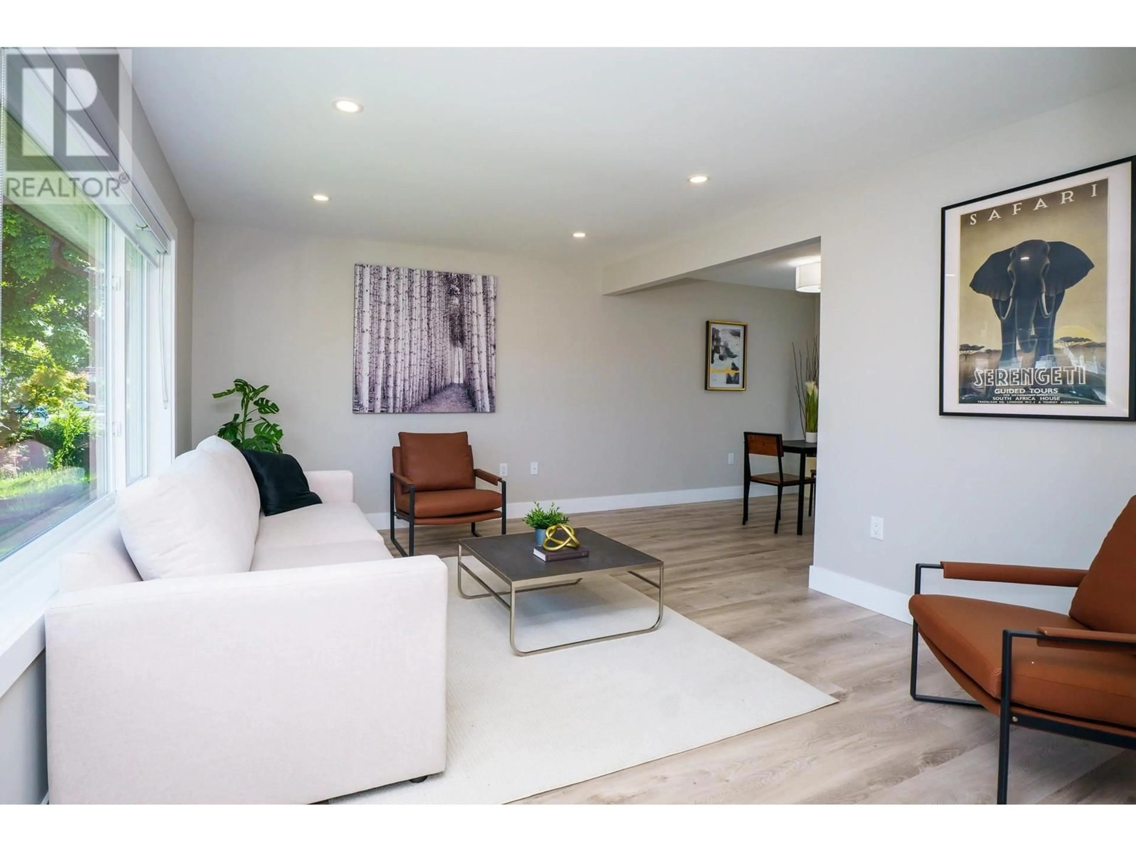 Living room with furniture, wood/laminate floor for 7987 GRAHAM AVENUE, Burnaby British Columbia V3N1V8