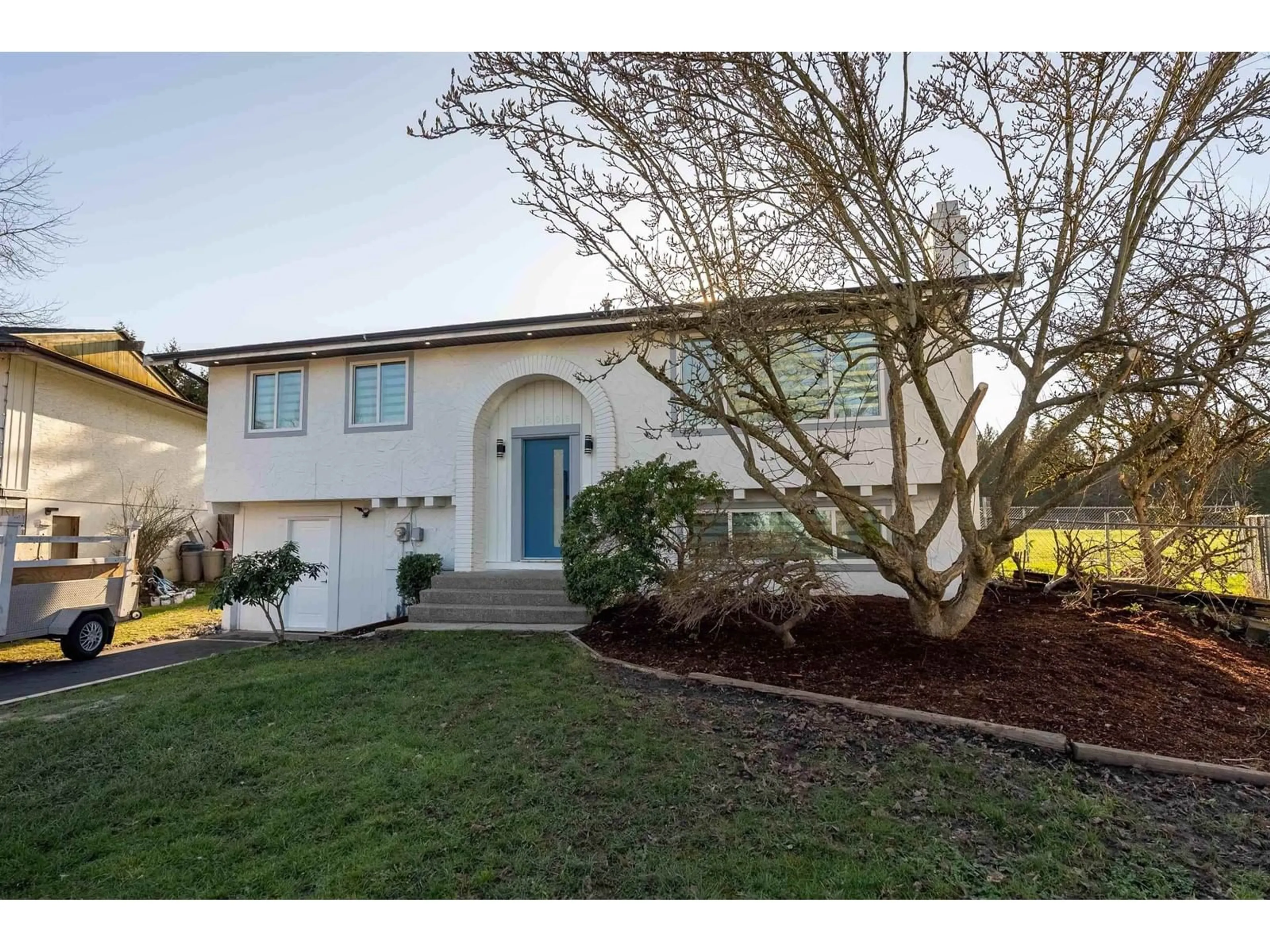 Home with vinyl exterior material, street for 20506 48B, Langley British Columbia V3A5P2