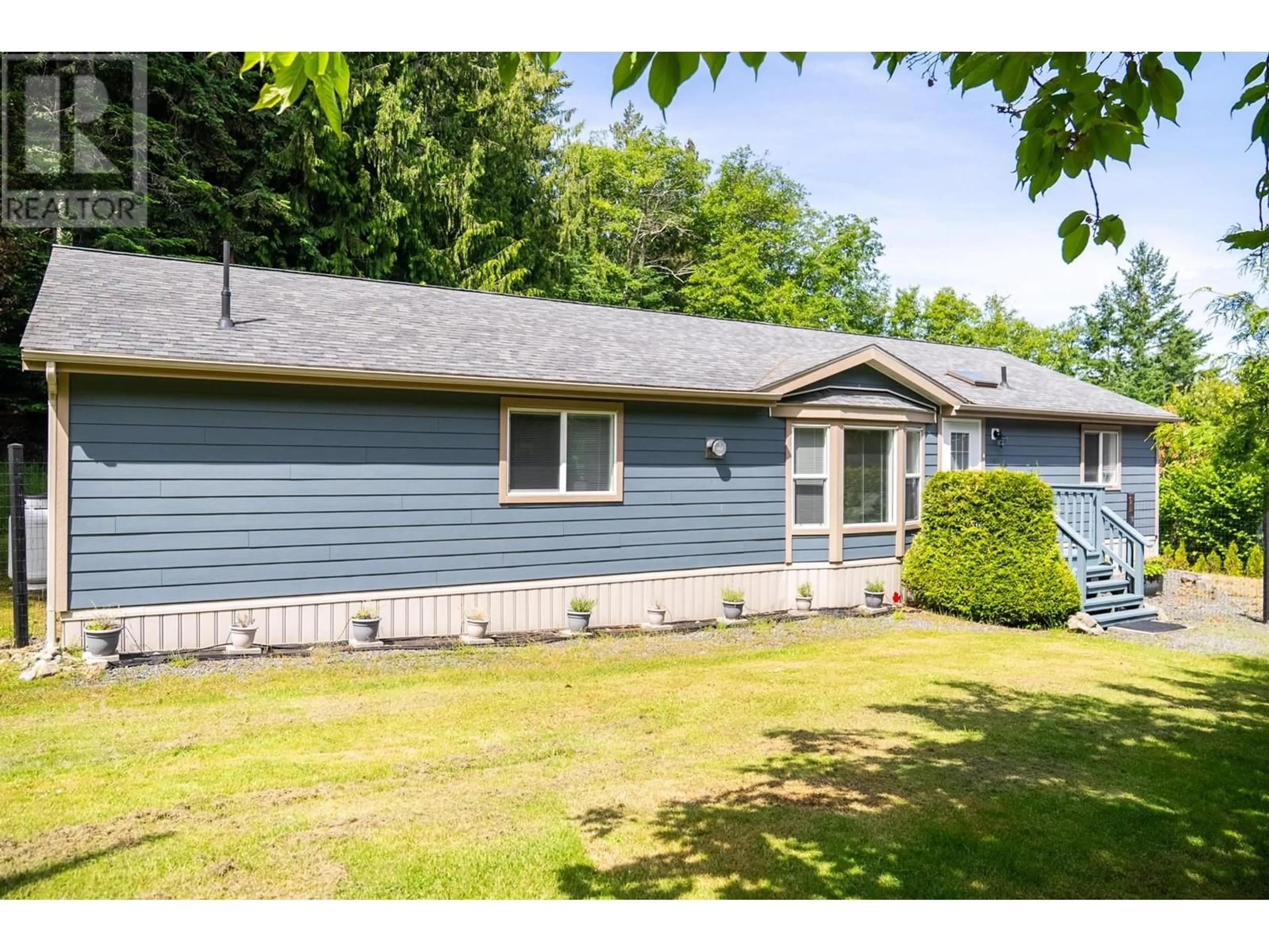 Home with vinyl exterior material, street for 2604 DORY WAY, Pender Island British Columbia V0N2M2