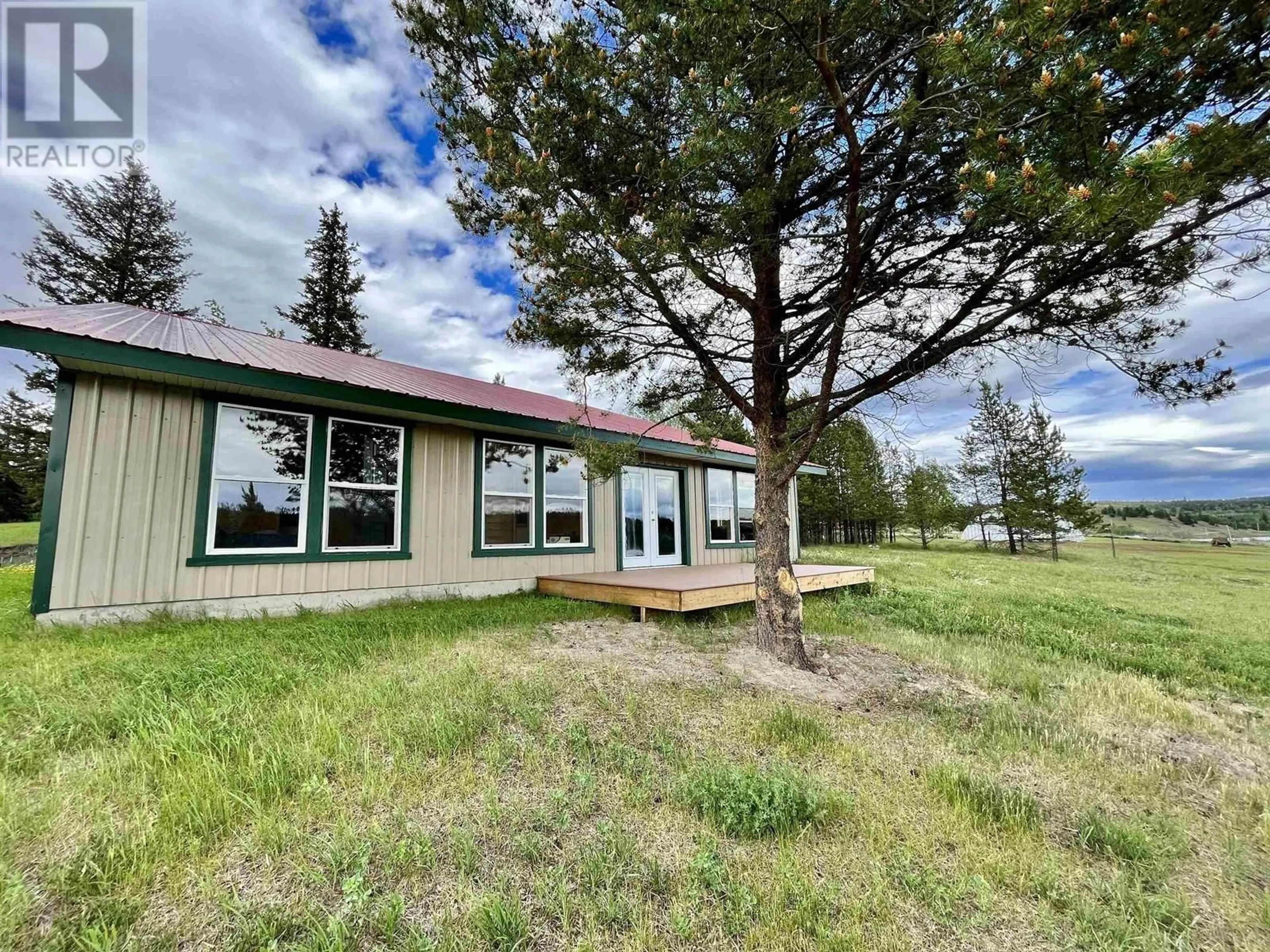 A pic from outside/outdoor area/front of a property/back of a property/a pic from drone, unknown for 5574 LAKESIDE COURT, 100 Mile House British Columbia V0K2E1