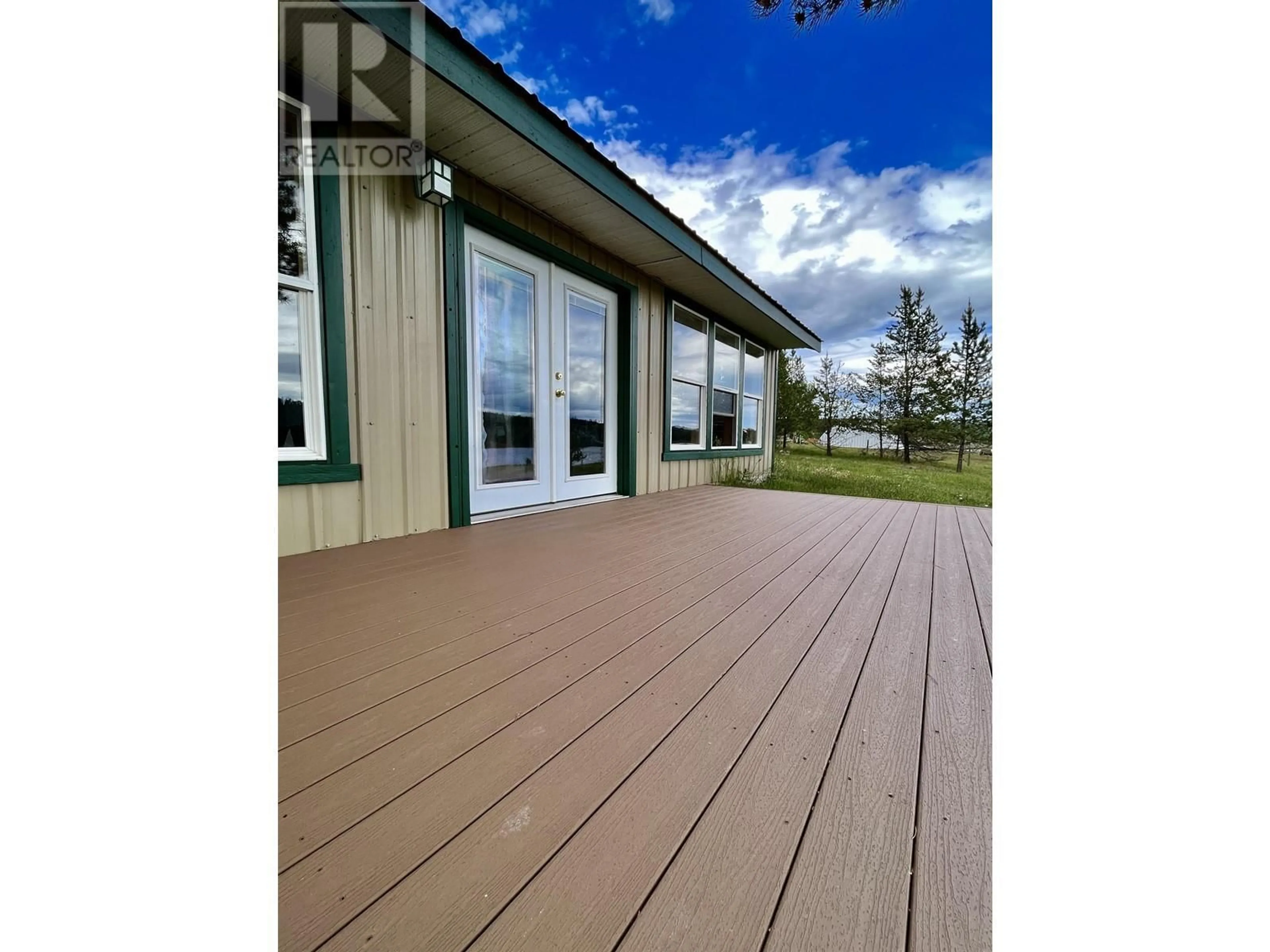 Home with vinyl exterior material, water/lake/river/ocean view for 5574 LAKESIDE COURT, 100 Mile House British Columbia V0K2E1