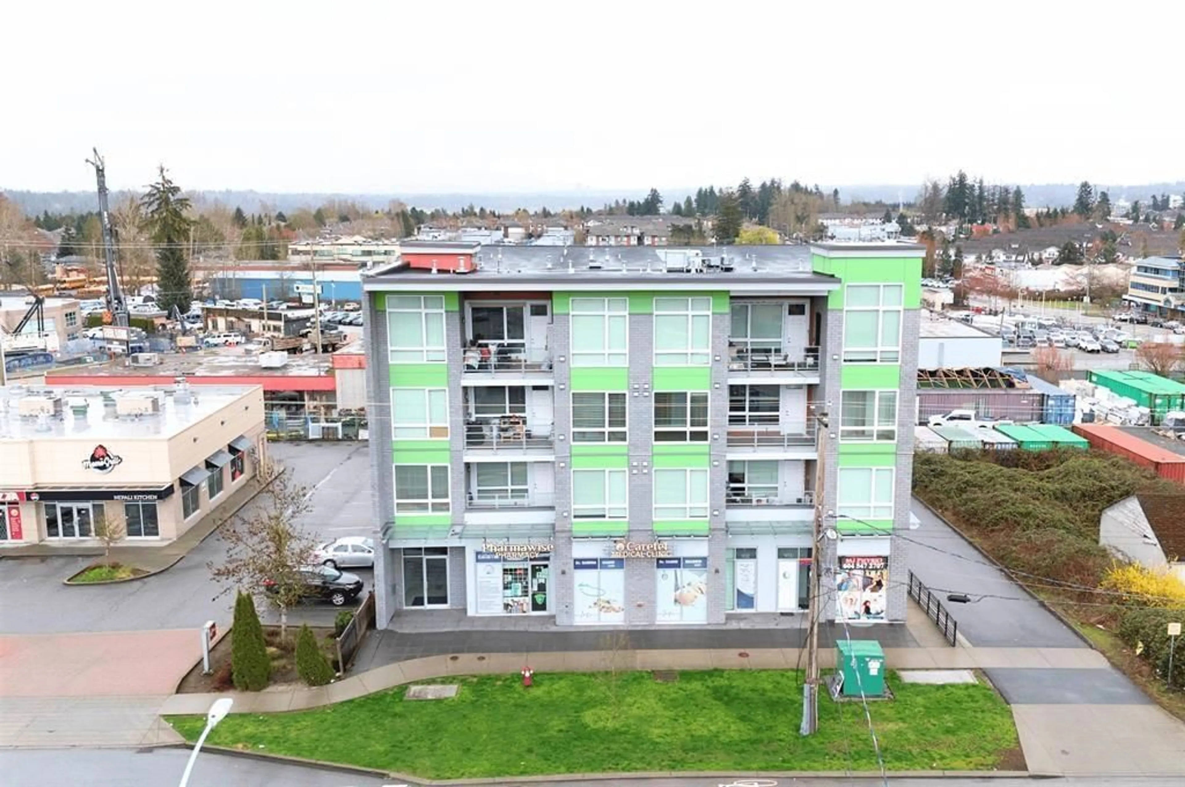 A pic from outside/outdoor area/front of a property/back of a property/a pic from drone, building for 201 - 8488 160, Surrey British Columbia V4N0V7