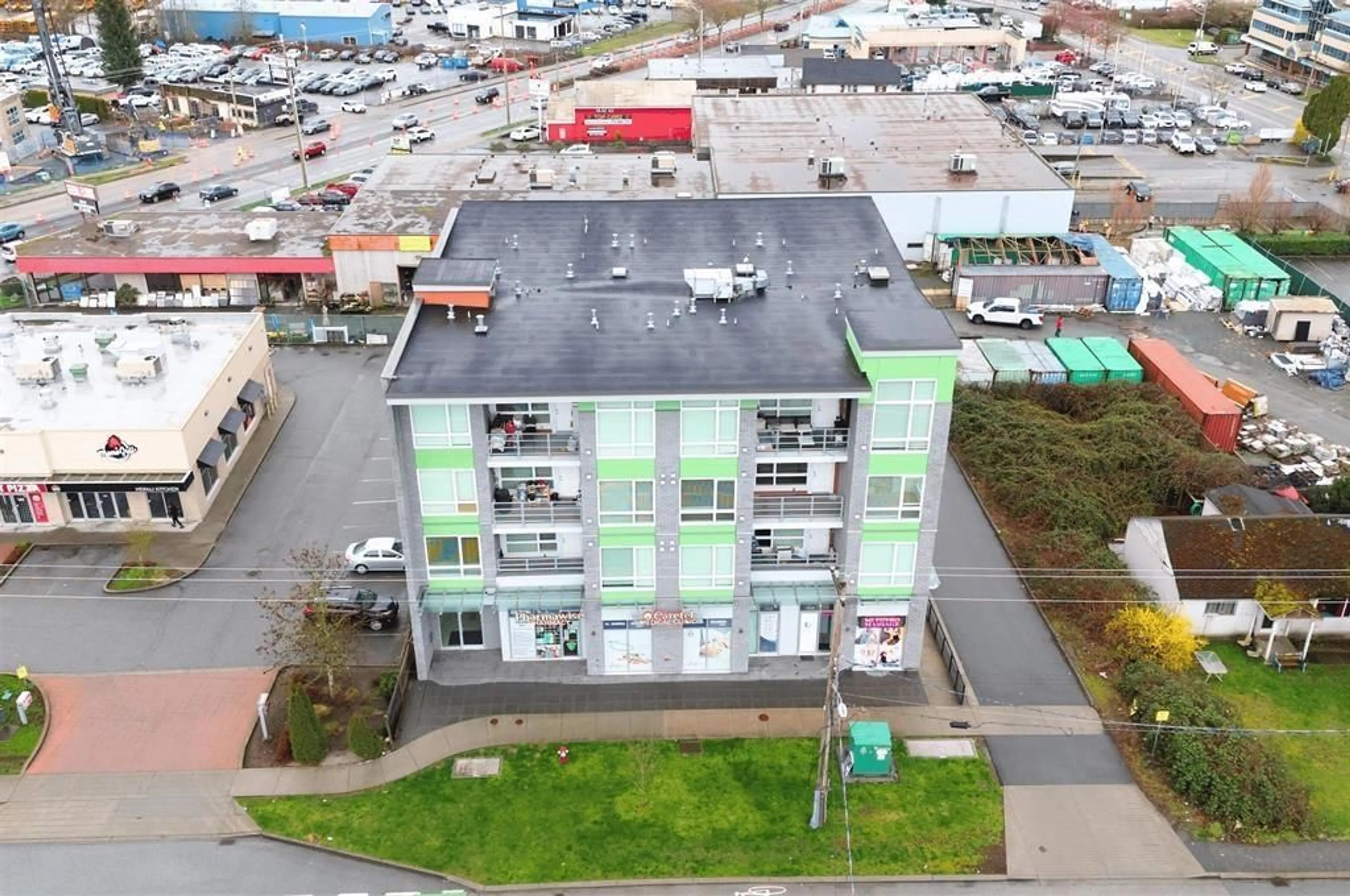 A pic from outside/outdoor area/front of a property/back of a property/a pic from drone, building for 201 - 8488 160, Surrey British Columbia V4N0V7