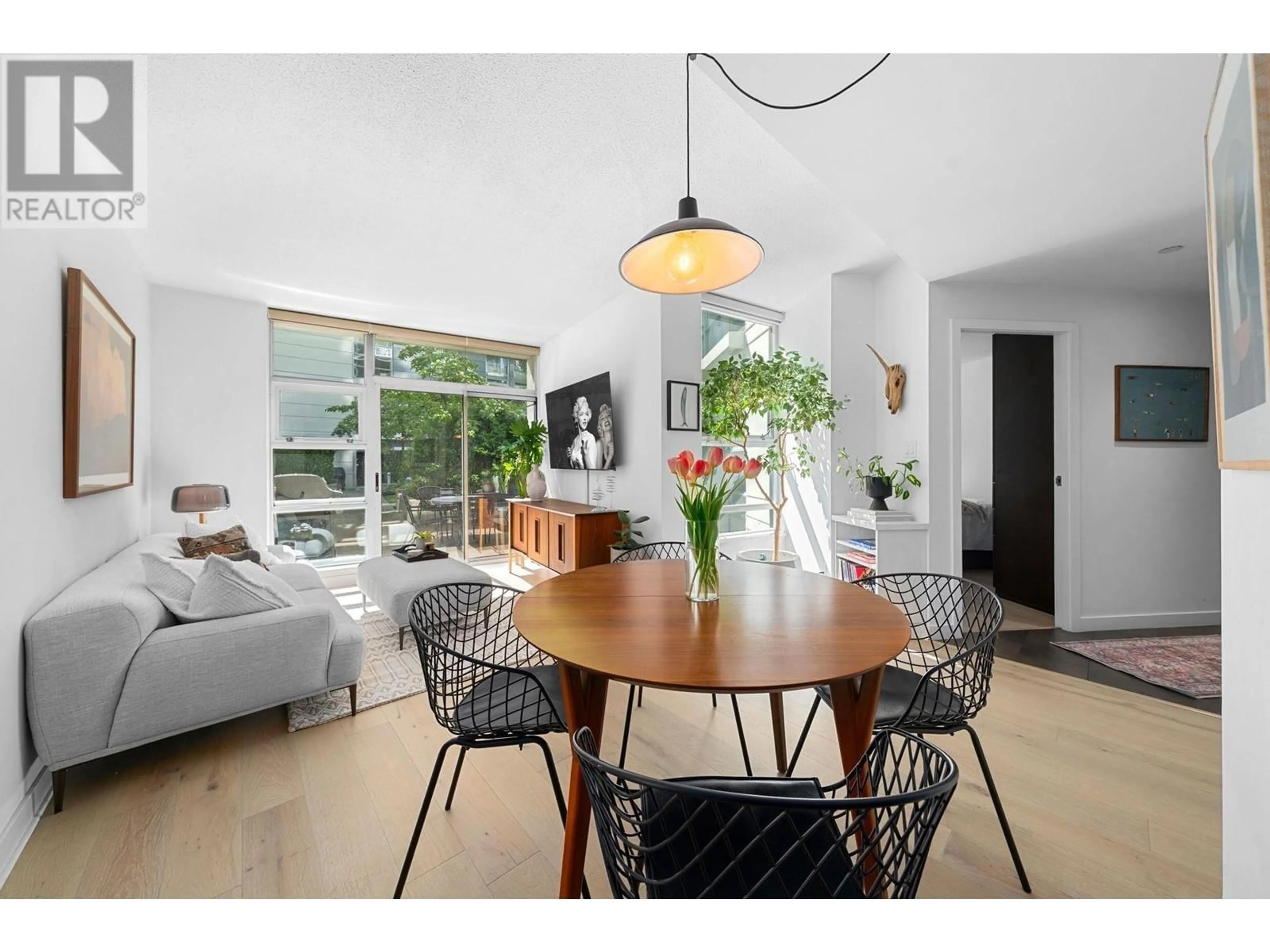 Dining room, wood/laminate floor for 101 - 638 BEACH CRESCENT, Vancouver British Columbia V6Z3H4
