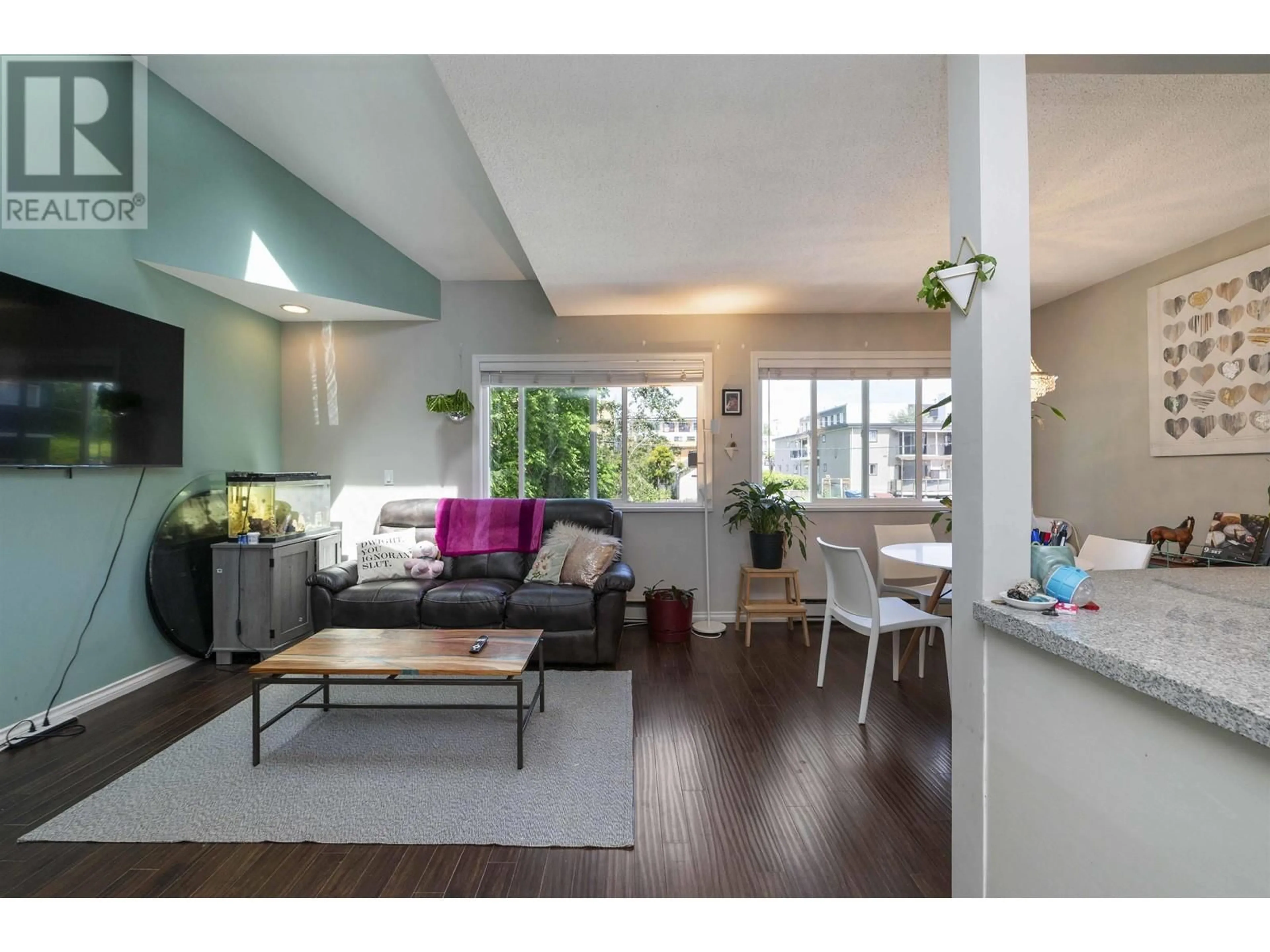 Living room with furniture, wood/laminate floor for 103 - 22367 ST ANNE AVENUE, Maple Ridge British Columbia V2X2E7