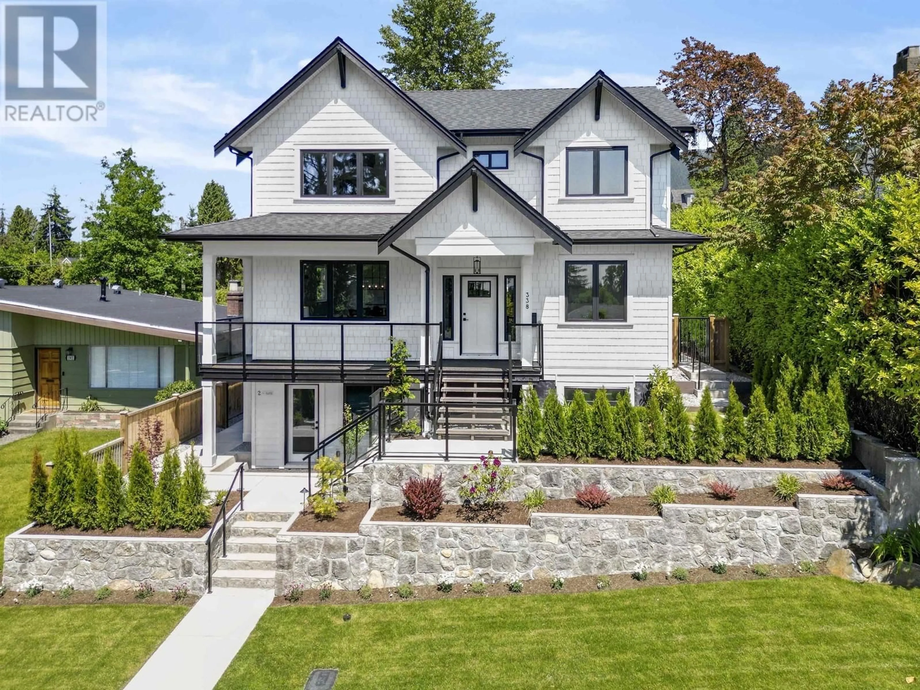Home with brick exterior material, street for 338 24TH STREET, North Vancouver British Columbia V7M2C6