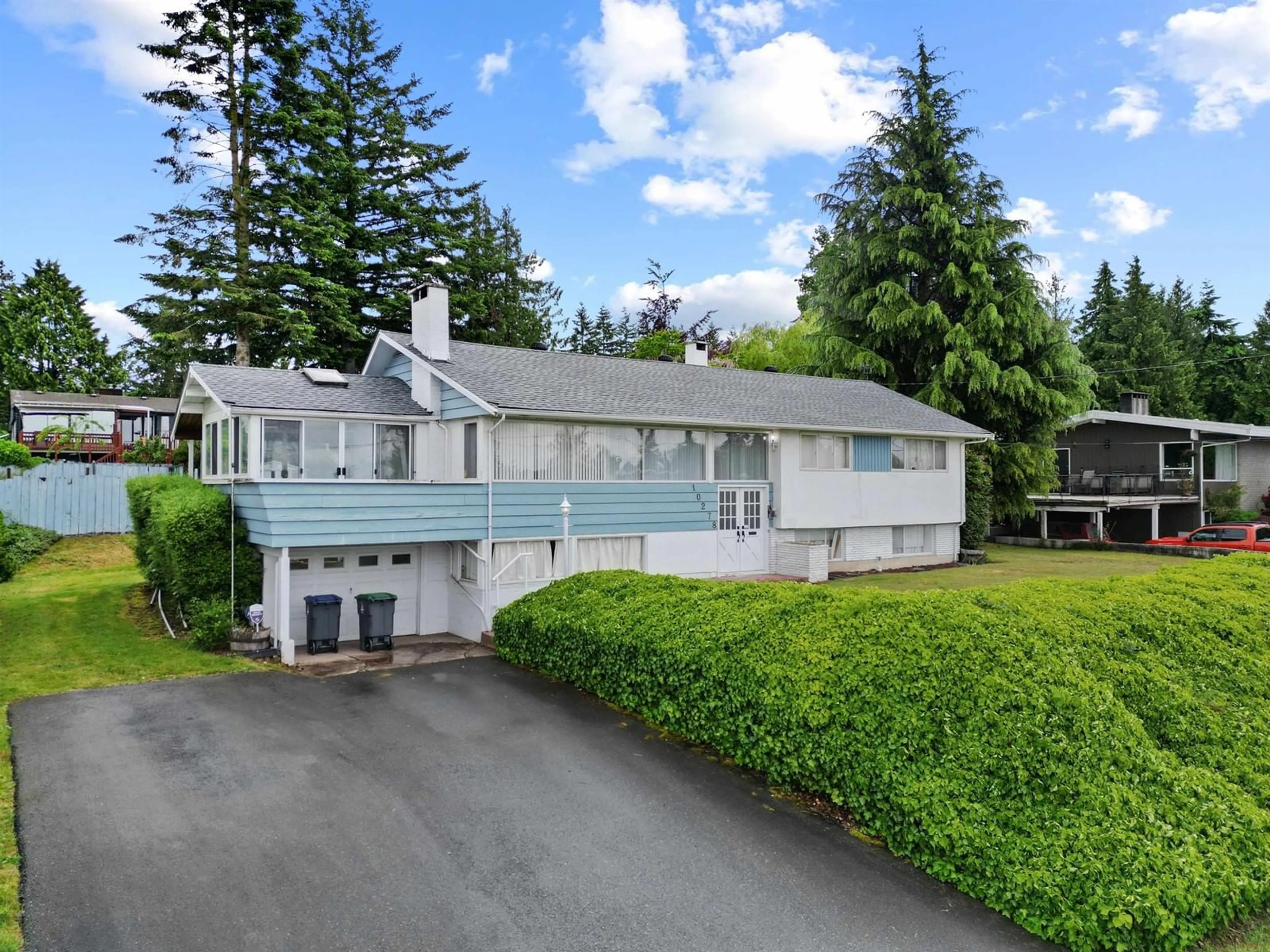 A pic from outside/outdoor area/front of a property/back of a property/a pic from drone, unknown for 10278 125, Surrey British Columbia V3V4Y4
