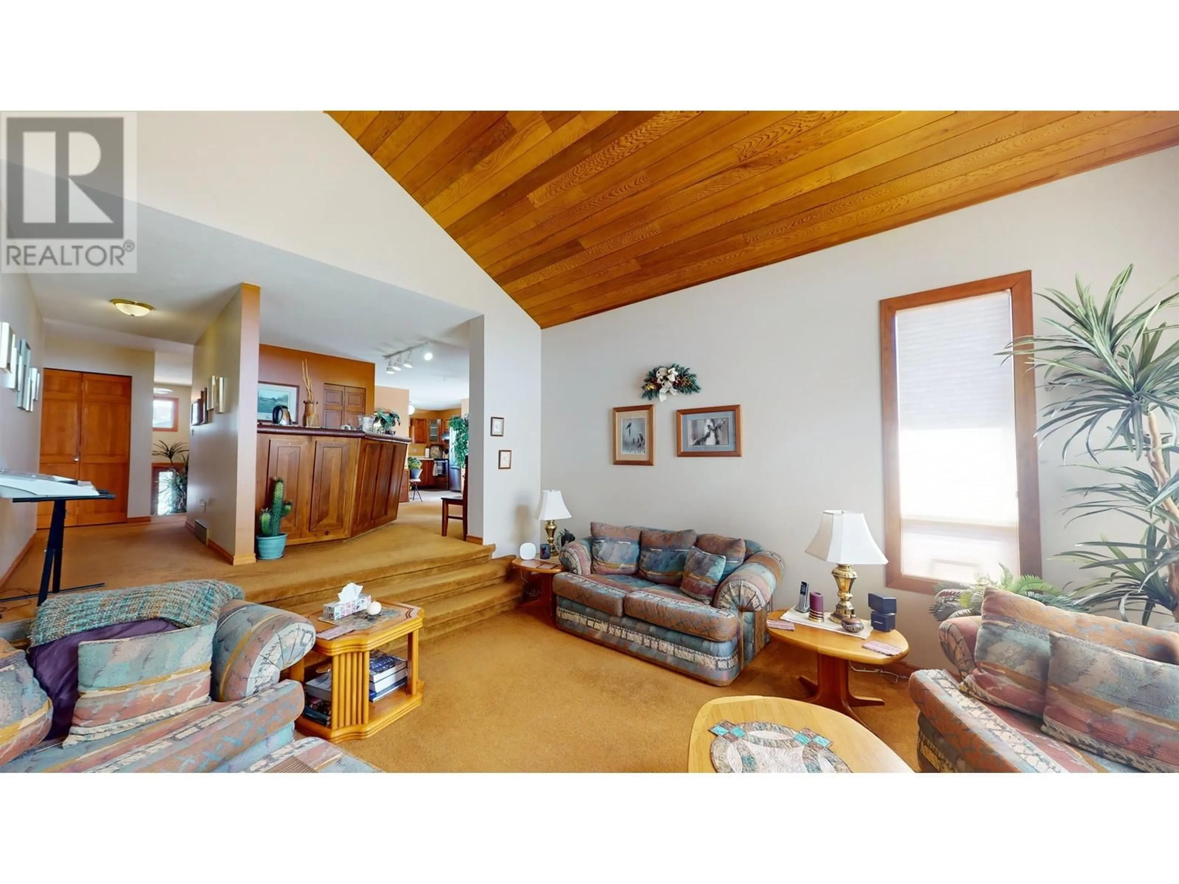 Living room with furniture, wood/laminate floor for 1975 SULLIVAN WAY, Houston British Columbia V0J1Z0