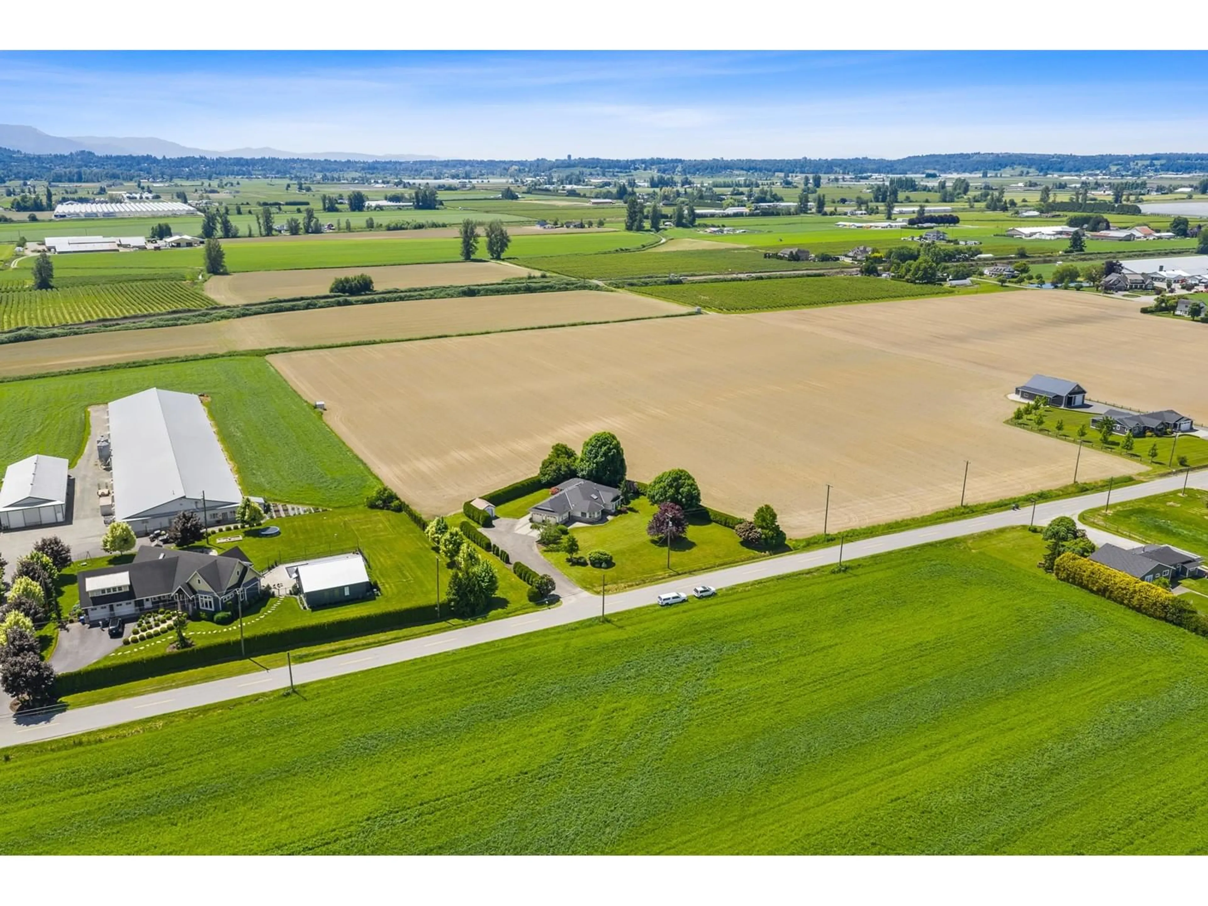 A pic from outside/outdoor area/front of a property/back of a property/a pic from drone, water/lake/river/ocean view for 34834 PAGE, Abbotsford British Columbia V3G1N8