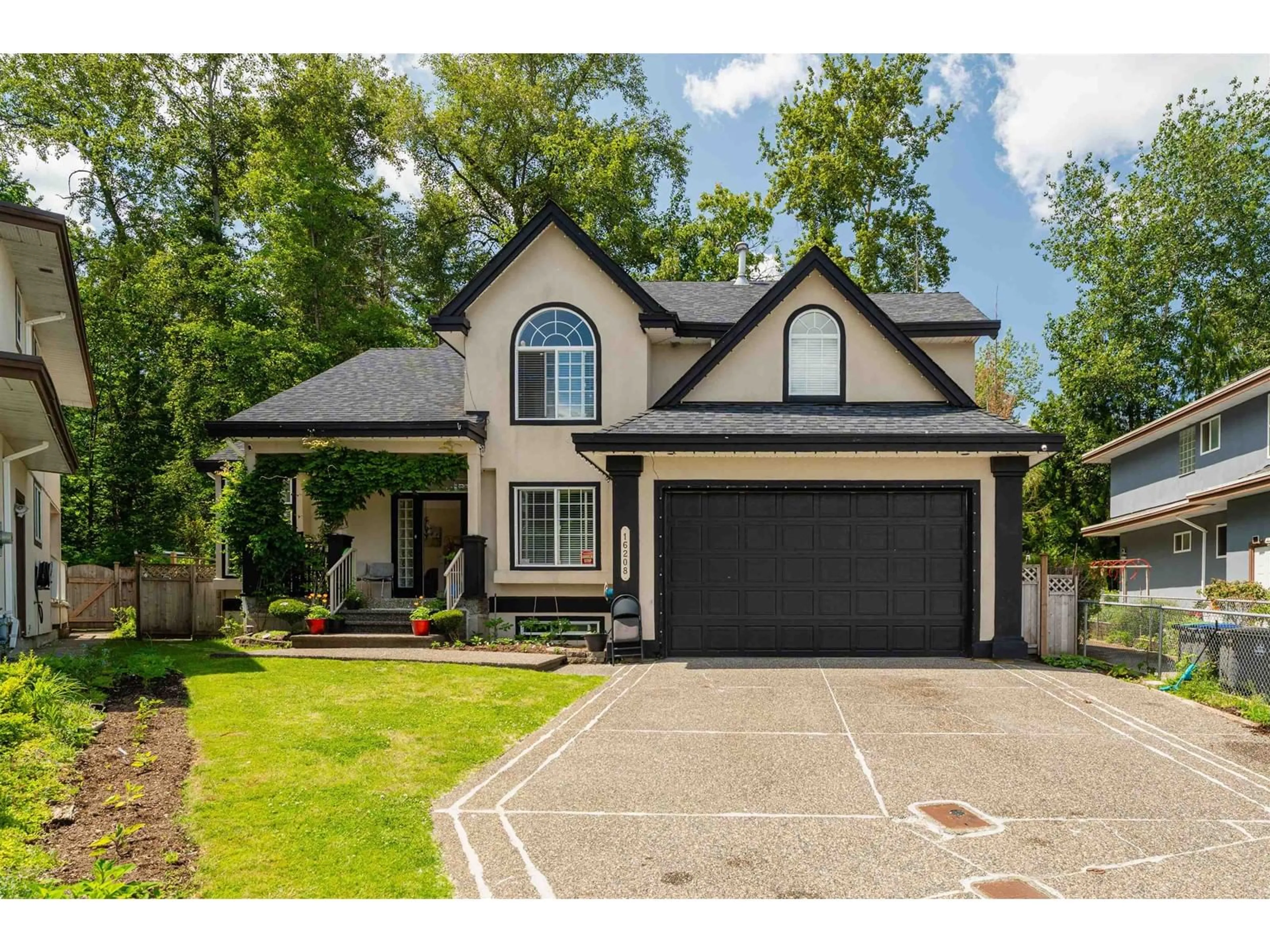 Home with vinyl exterior material, street for 16208 93A, Surrey British Columbia V4N4Z9