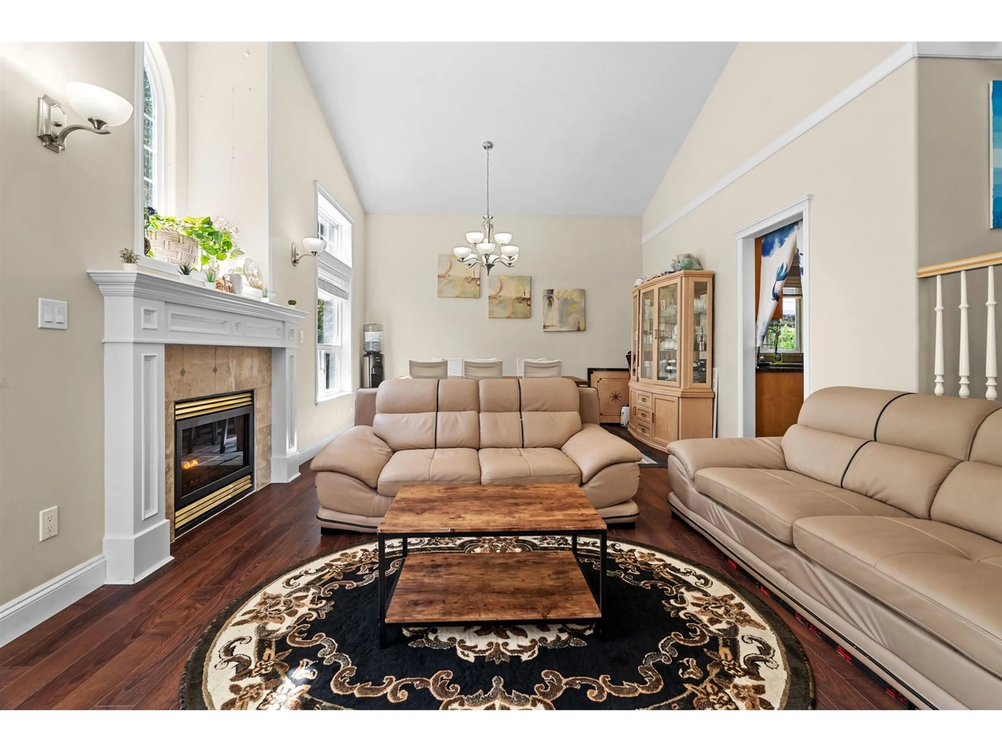 Living room with furniture, wood/laminate floor for 16208 93A, Surrey British Columbia V4N4Z9
