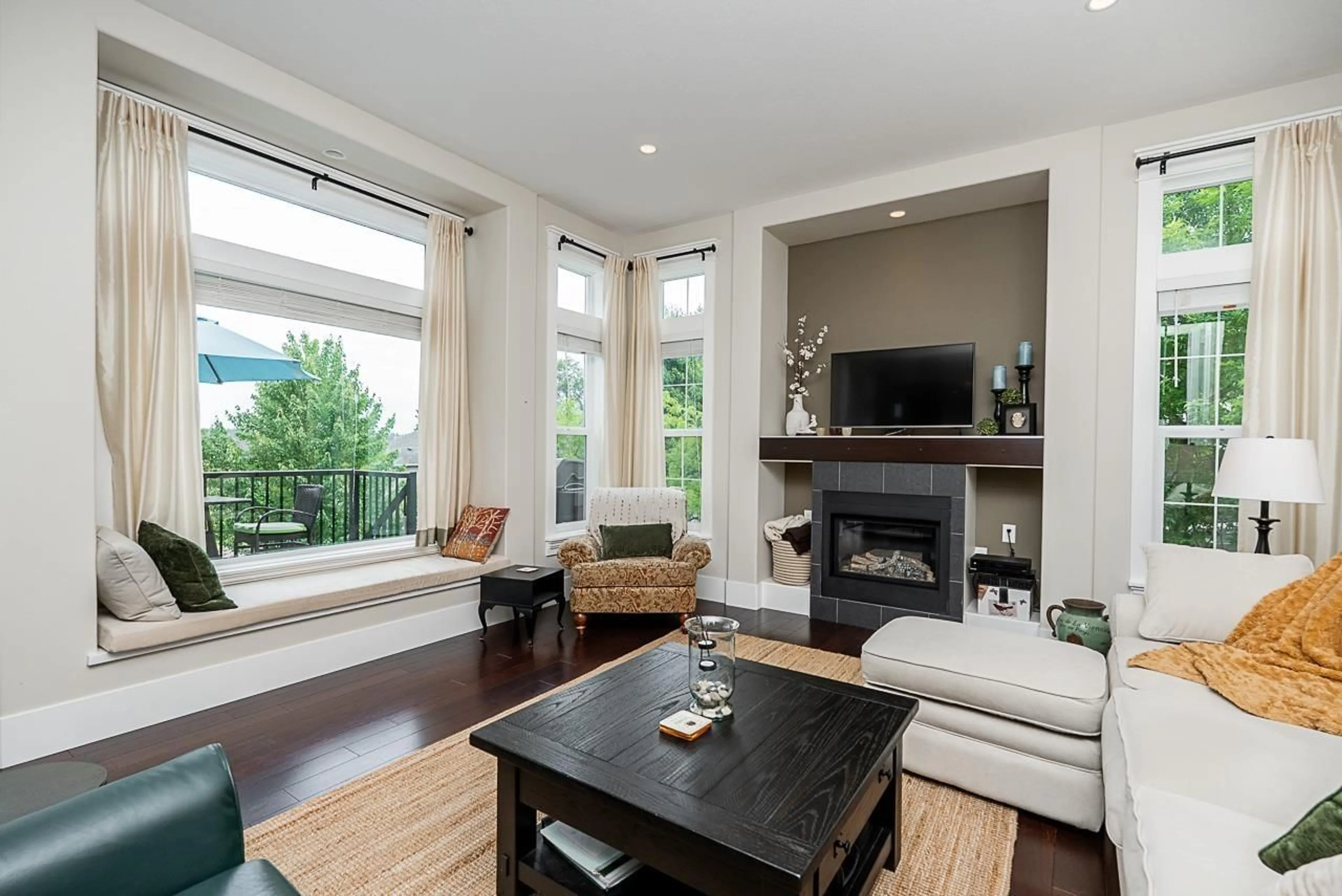 Living room with furniture, wood/laminate floor for 6149 163, Surrey British Columbia V3S1S5