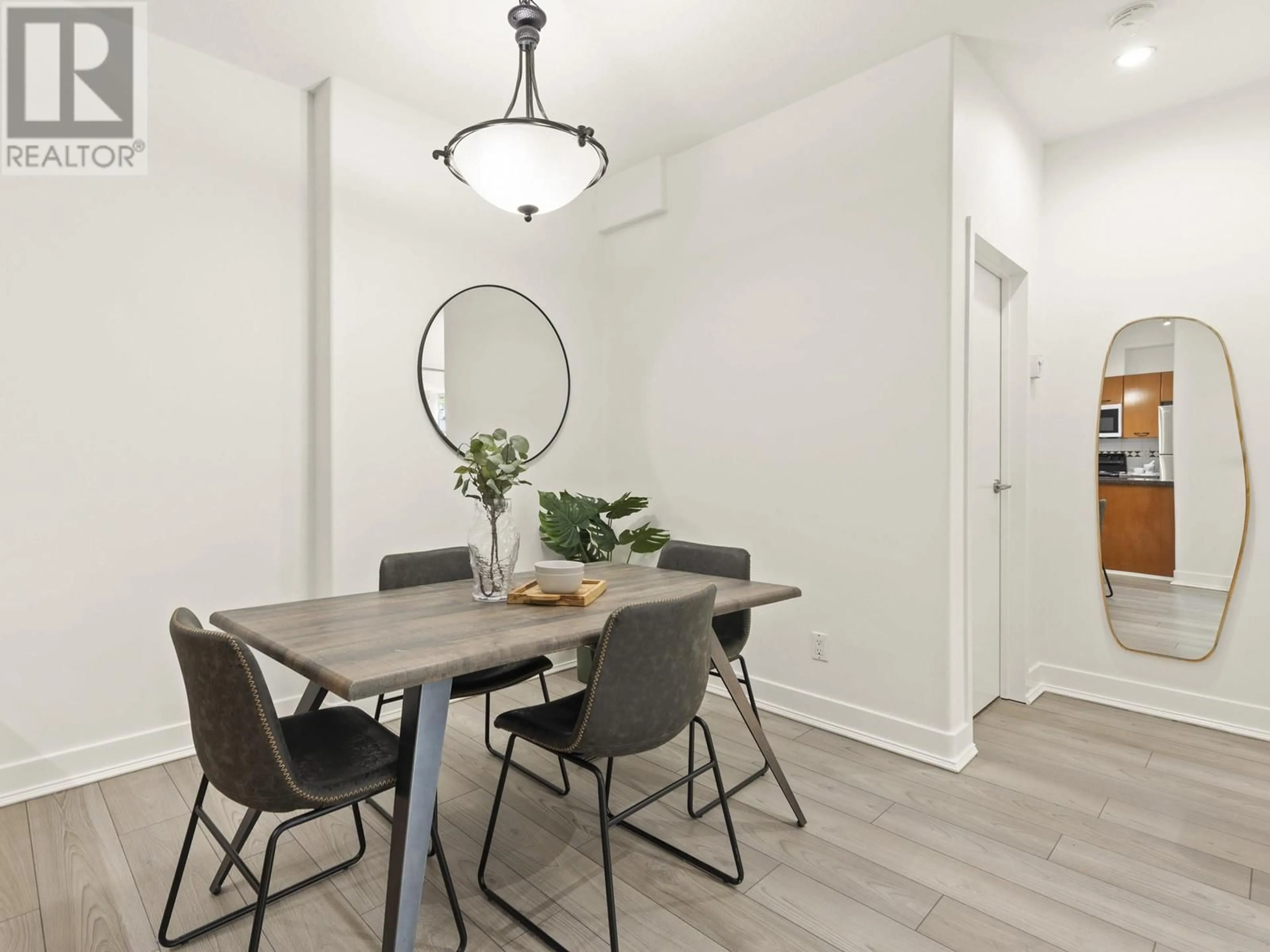 Dining room, wood/laminate floor for 115 - 1823 7TH AVENUE, Vancouver British Columbia V6J5K5