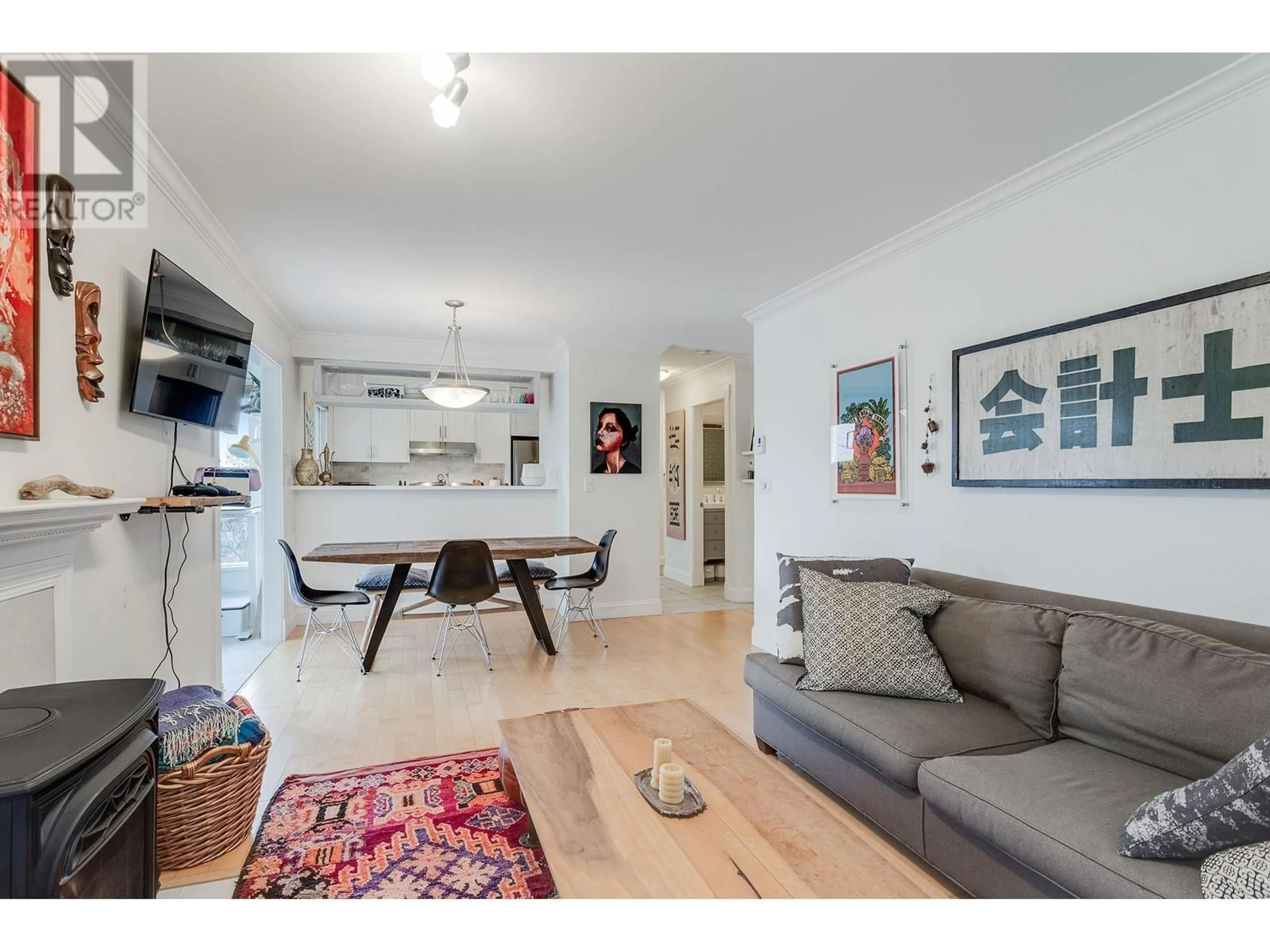 Living room with furniture, wood/laminate floor for 204 - 507 6TH AVENUE, Vancouver British Columbia V5T1K9