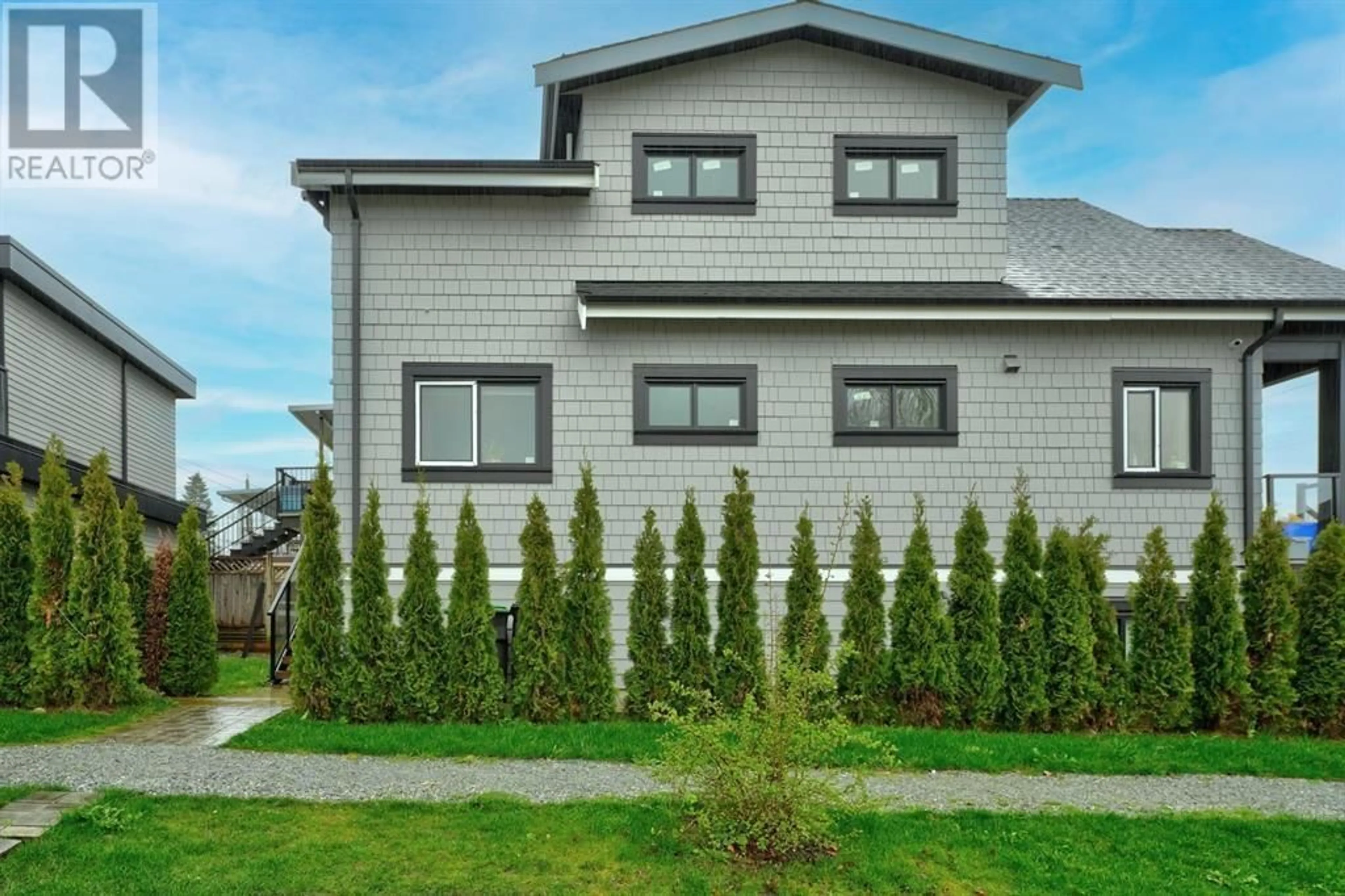 Home with vinyl exterior material, street for 1204 KASLO STREET, Vancouver British Columbia V5K3Z7