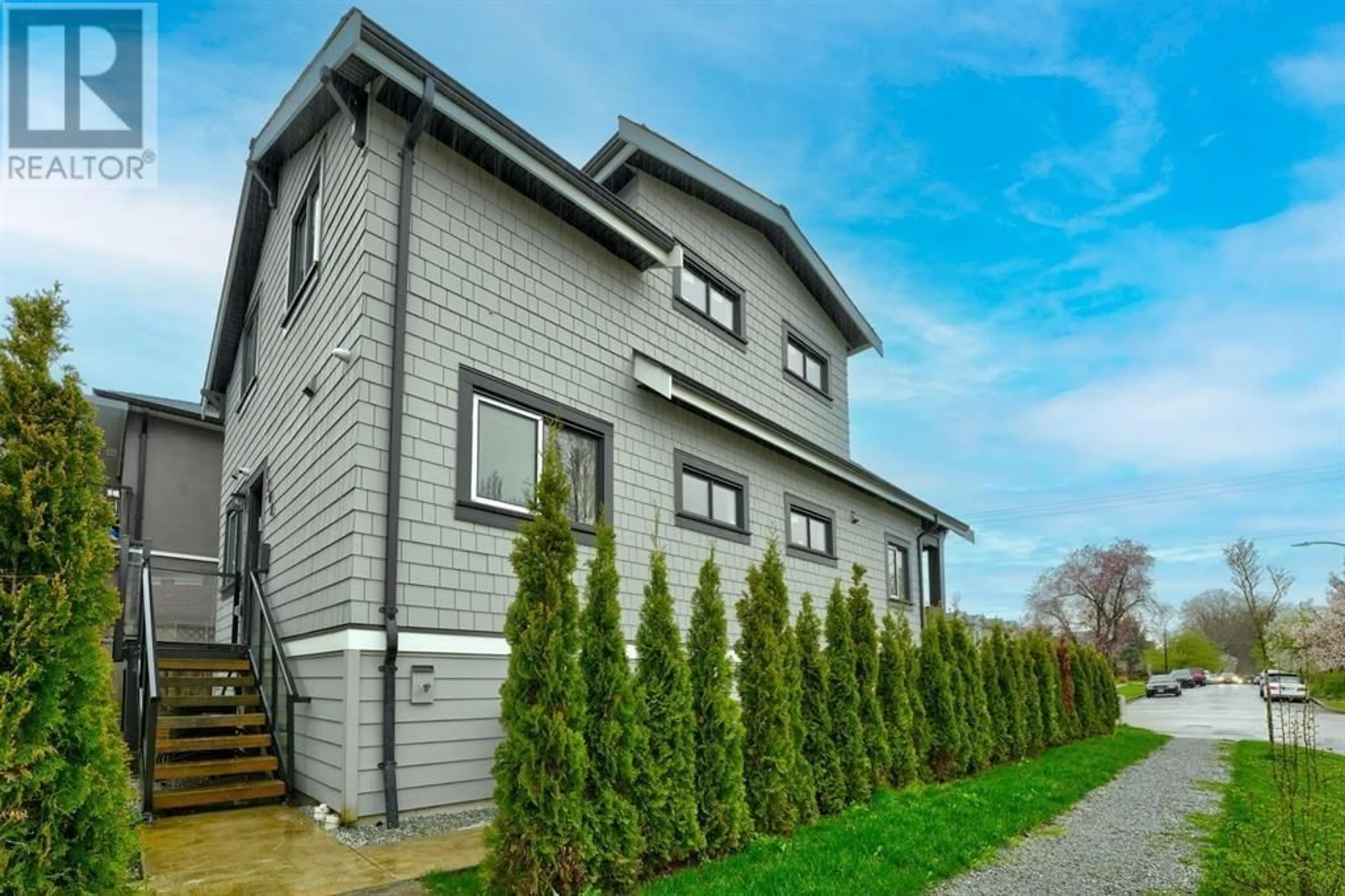 Home with vinyl exterior material, street for 1204 KASLO STREET, Vancouver British Columbia V5K3Z7