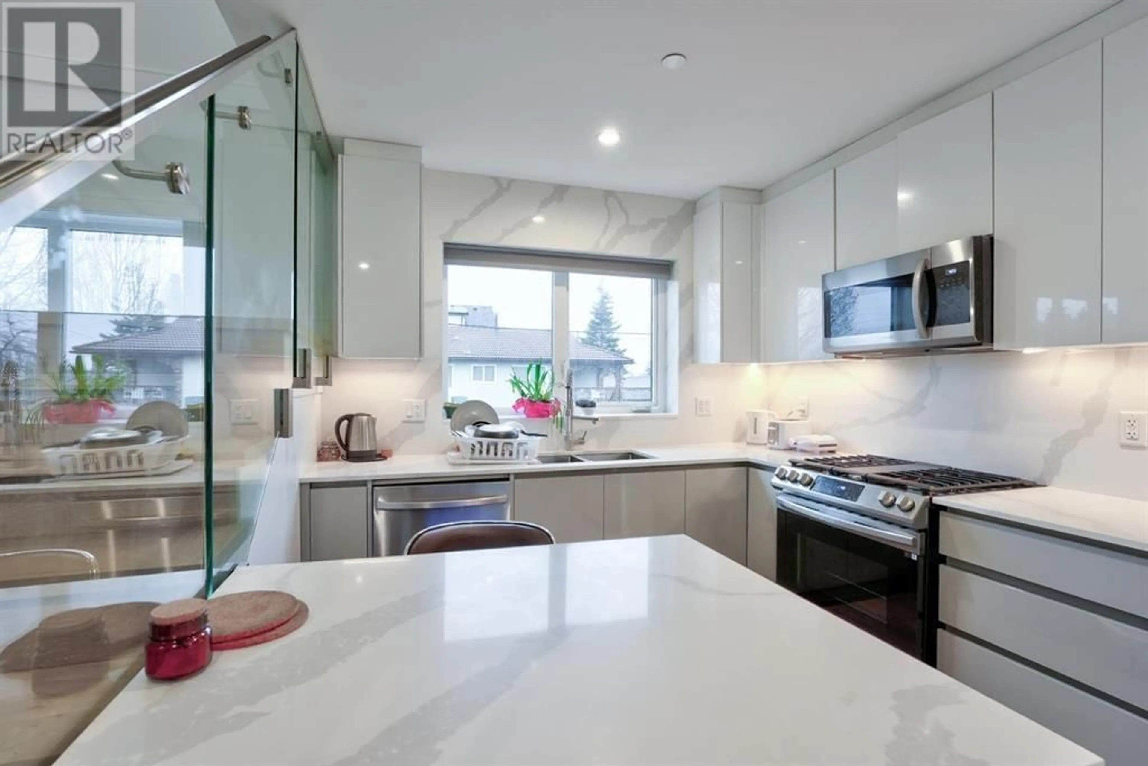 Contemporary kitchen, ceramic/tile floor for 1204 KASLO STREET, Vancouver British Columbia V5K3Z7