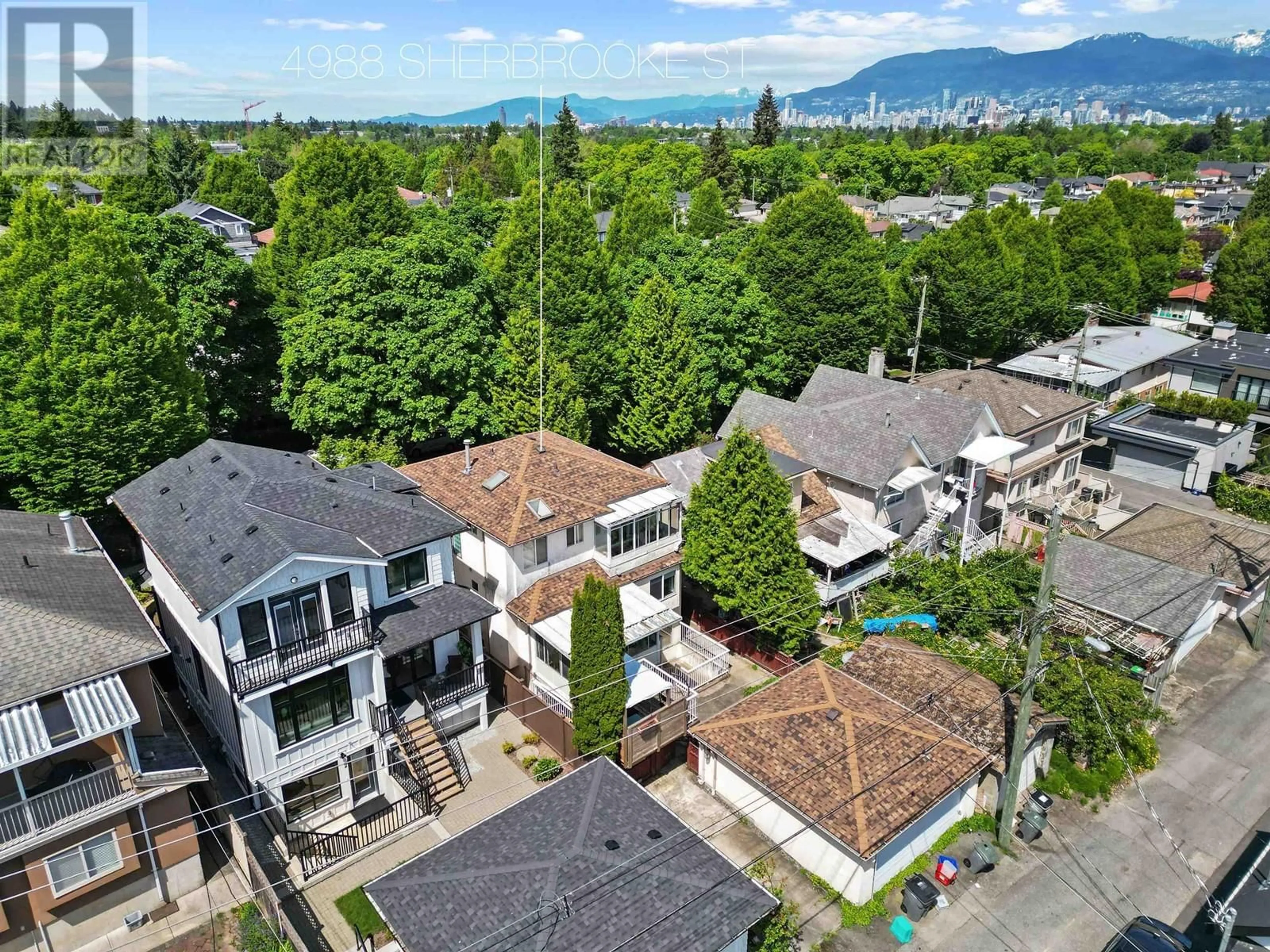 A pic from outside/outdoor area/front of a property/back of a property/a pic from drone, mountain view for 4988 SHERBROOKE STREET, Vancouver British Columbia V5W3M2
