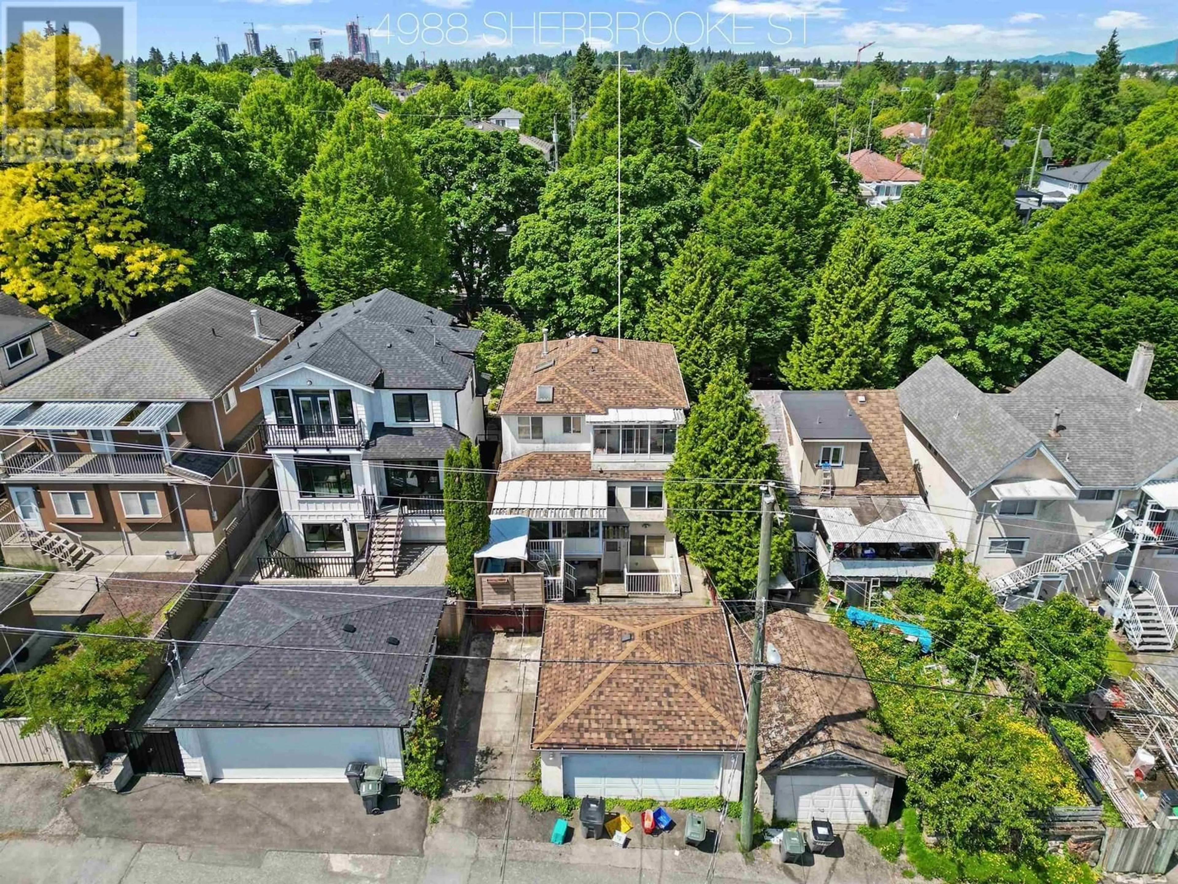 A pic from outside/outdoor area/front of a property/back of a property/a pic from drone, street for 4988 SHERBROOKE STREET, Vancouver British Columbia V5W3M2