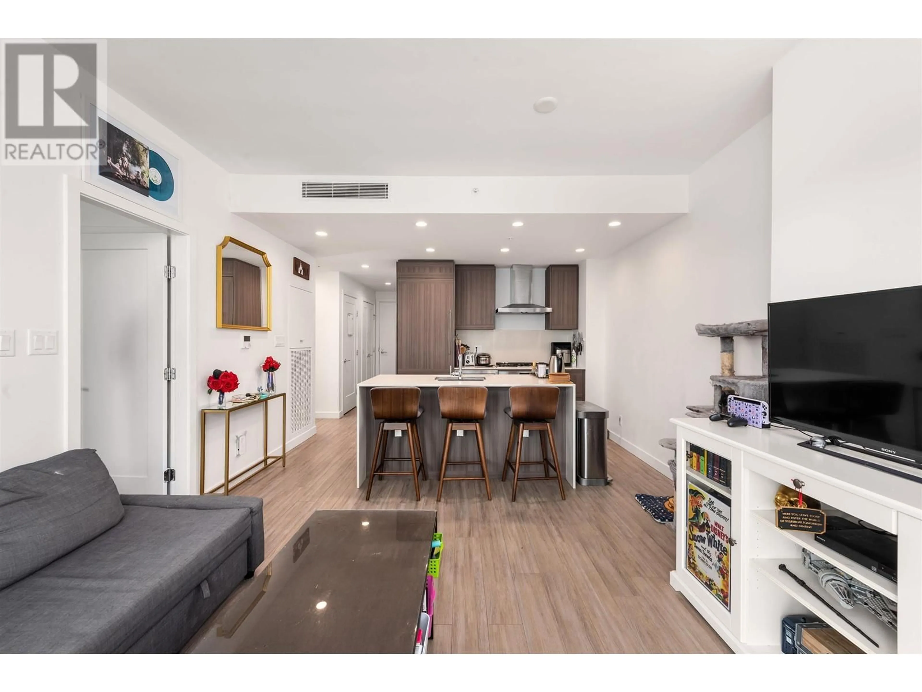 Open concept kitchen, wood/laminate floor for 2104 - 2311 BETA AVENUE, Burnaby British Columbia V5C0M1