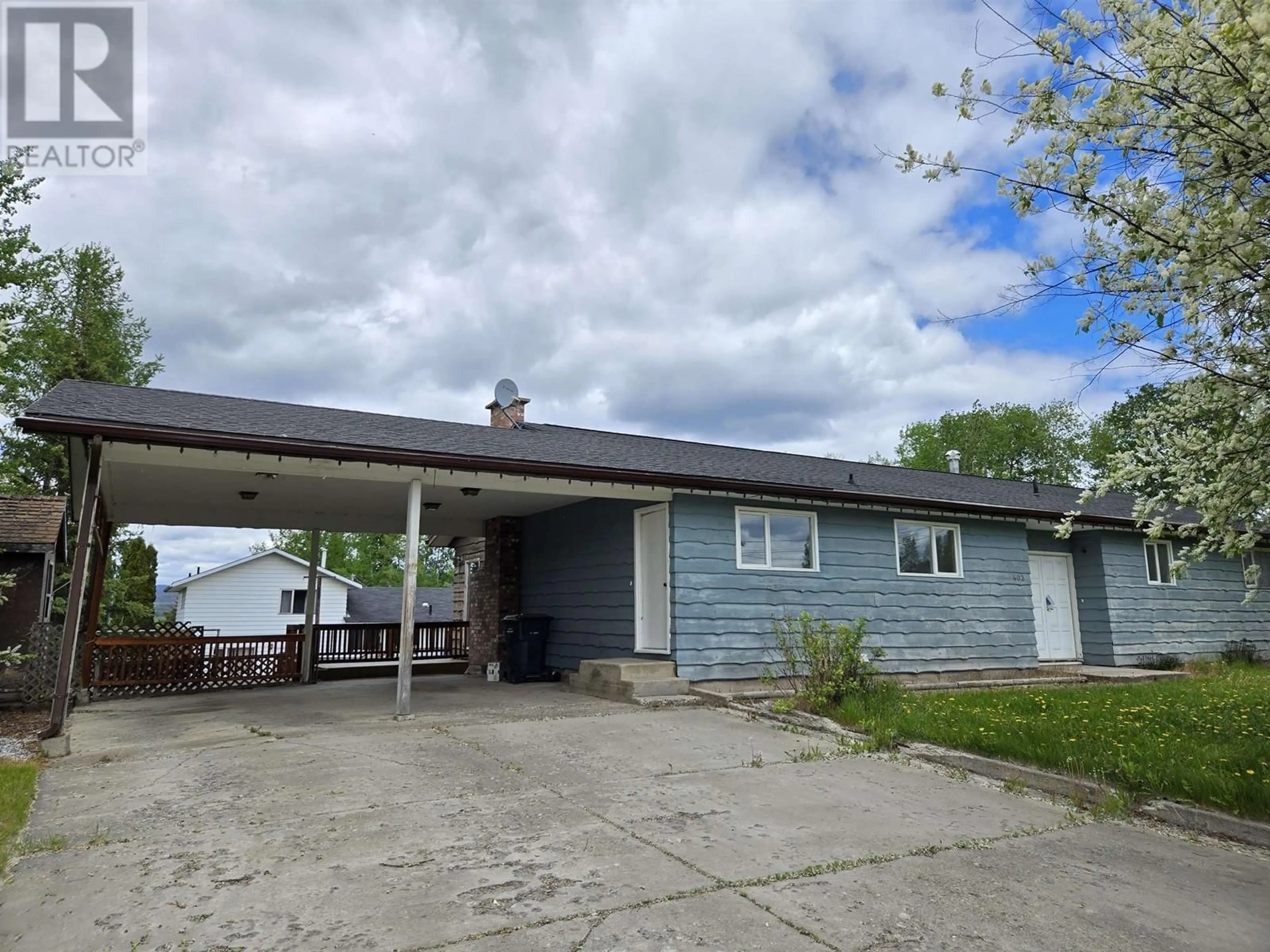 A pic from outside/outdoor area/front of a property/back of a property/a pic from drone, street for 403 TUNASA DRIVE, Fraser Lake British Columbia V0J1S0