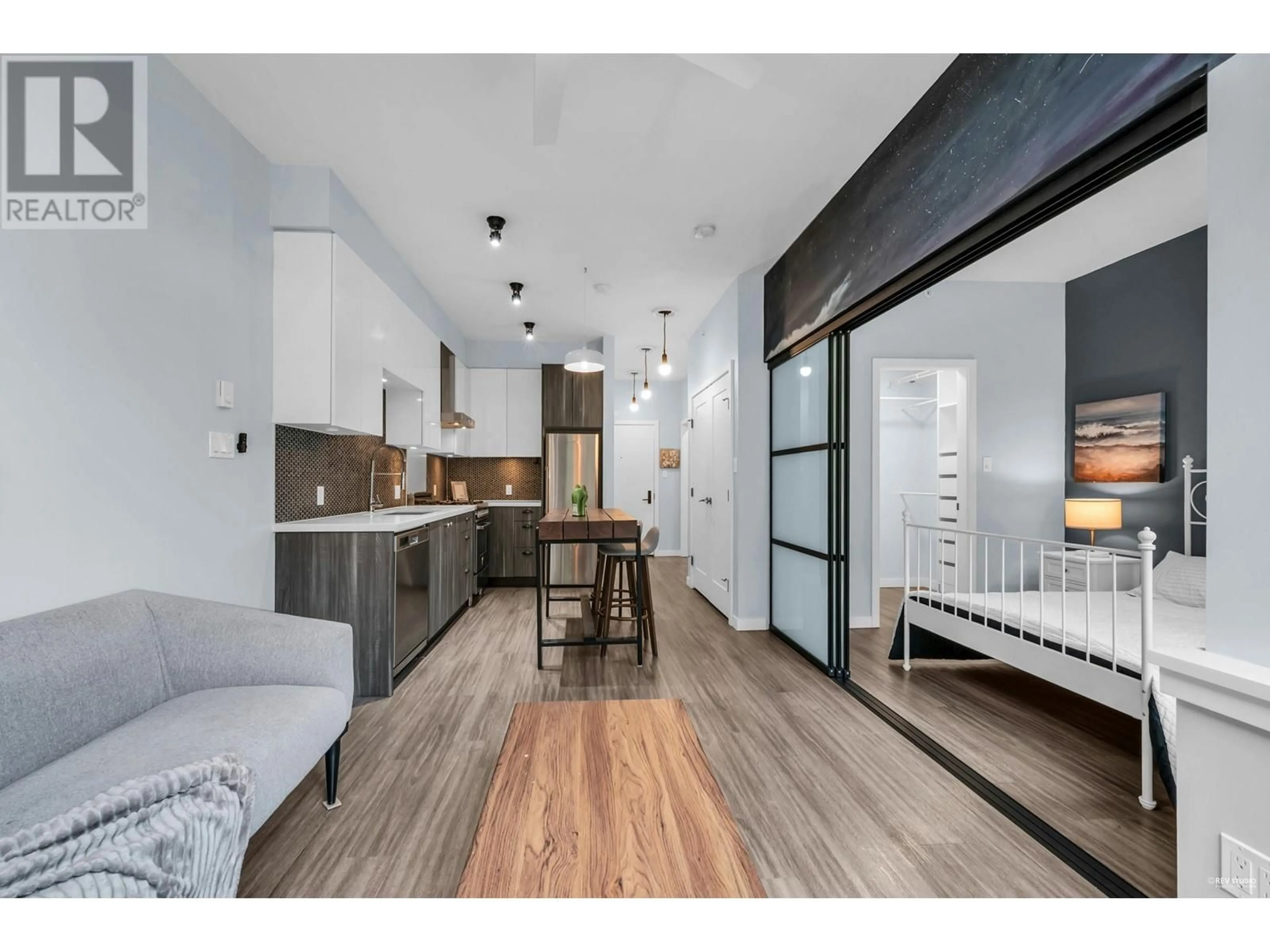 Open concept kitchen, wood/laminate floor for 206 - 311 6TH AVENUE, Vancouver British Columbia V5T1J9