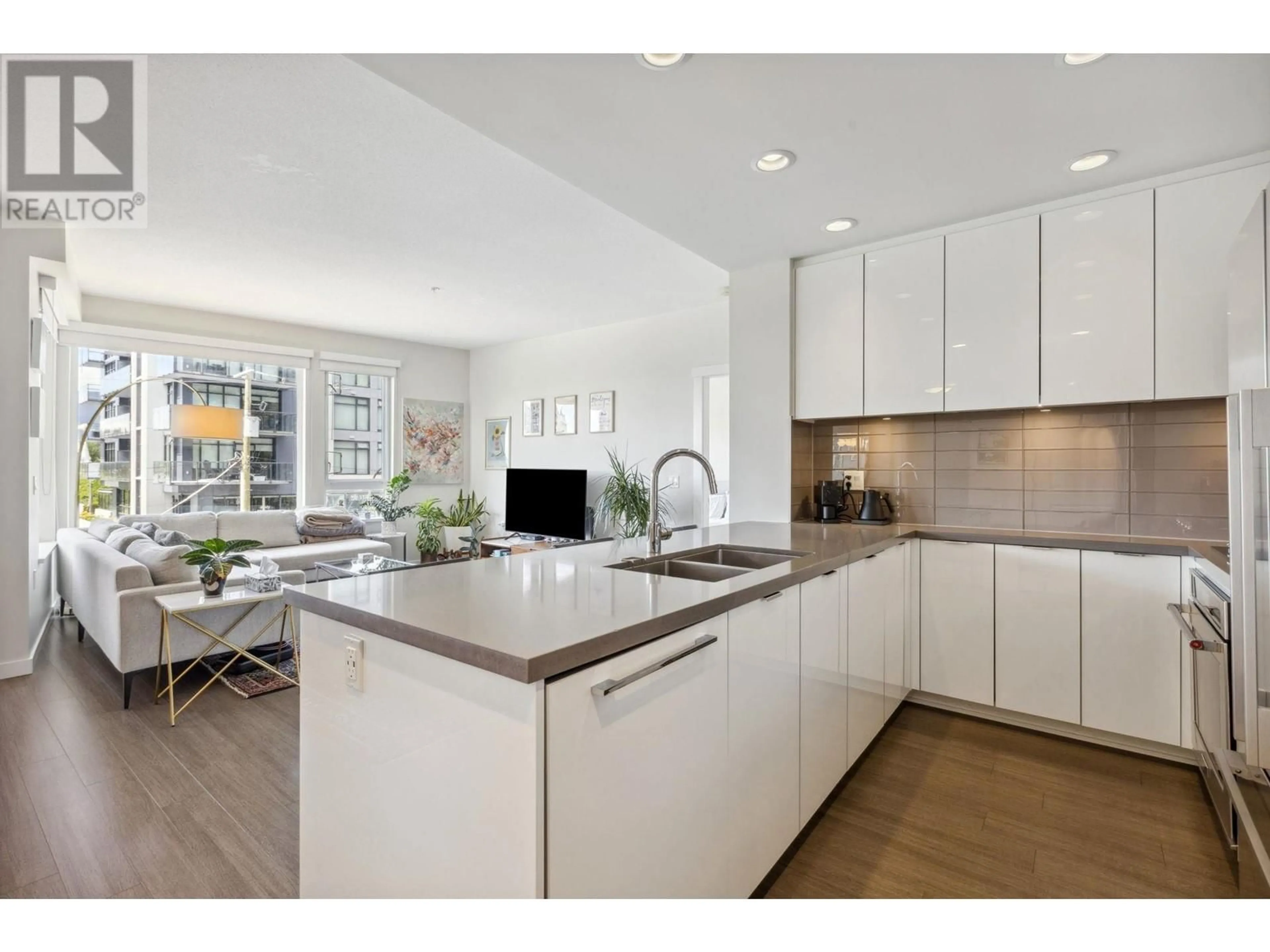 Open concept kitchen, ceramic/tile floor for 209 - 277 1ST STREET, North Vancouver British Columbia V7M0E8