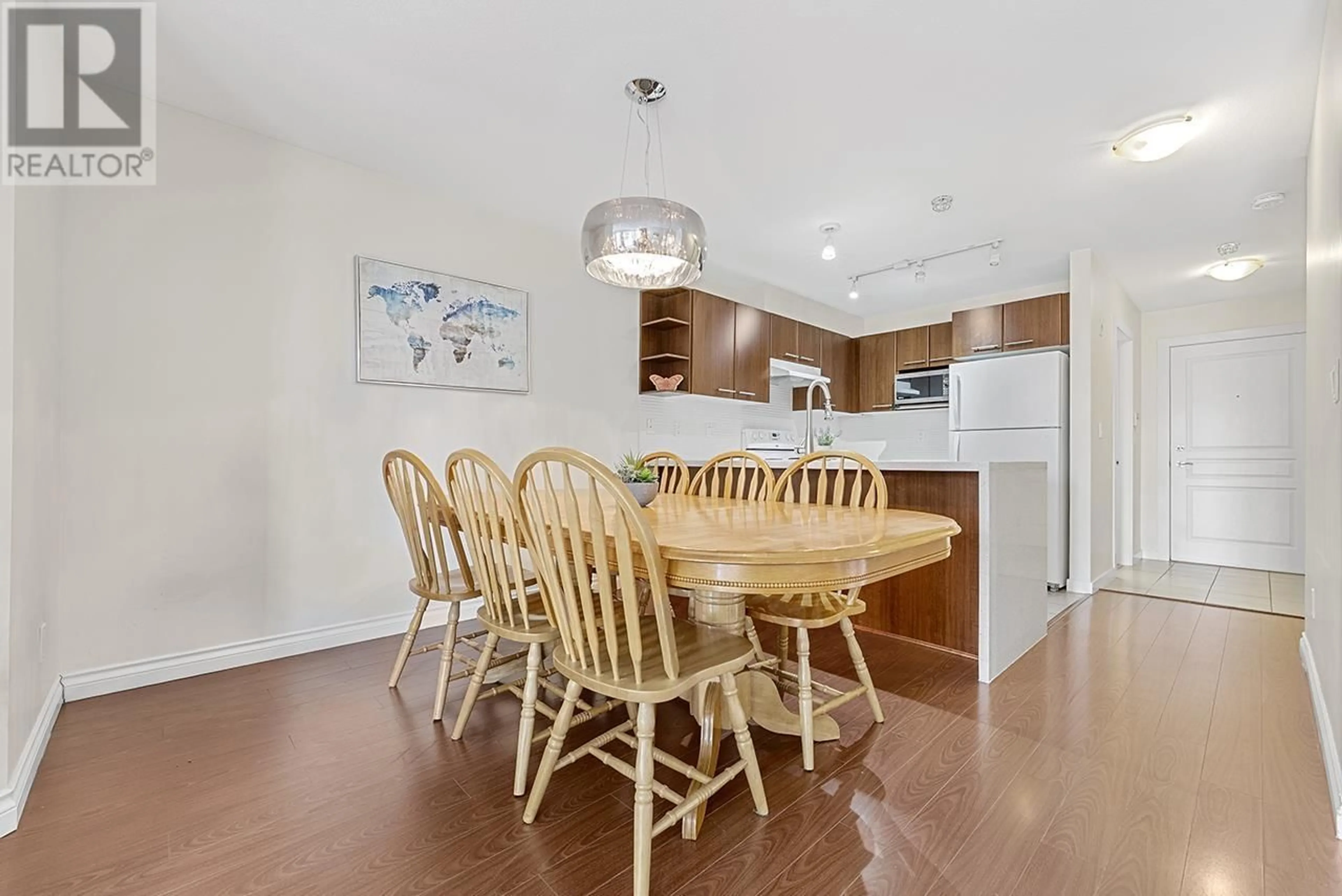 Open concept kitchen, wood/laminate floor for 108 - 4833 BRENTWOOD DRIVE, Burnaby British Columbia V5C0C3