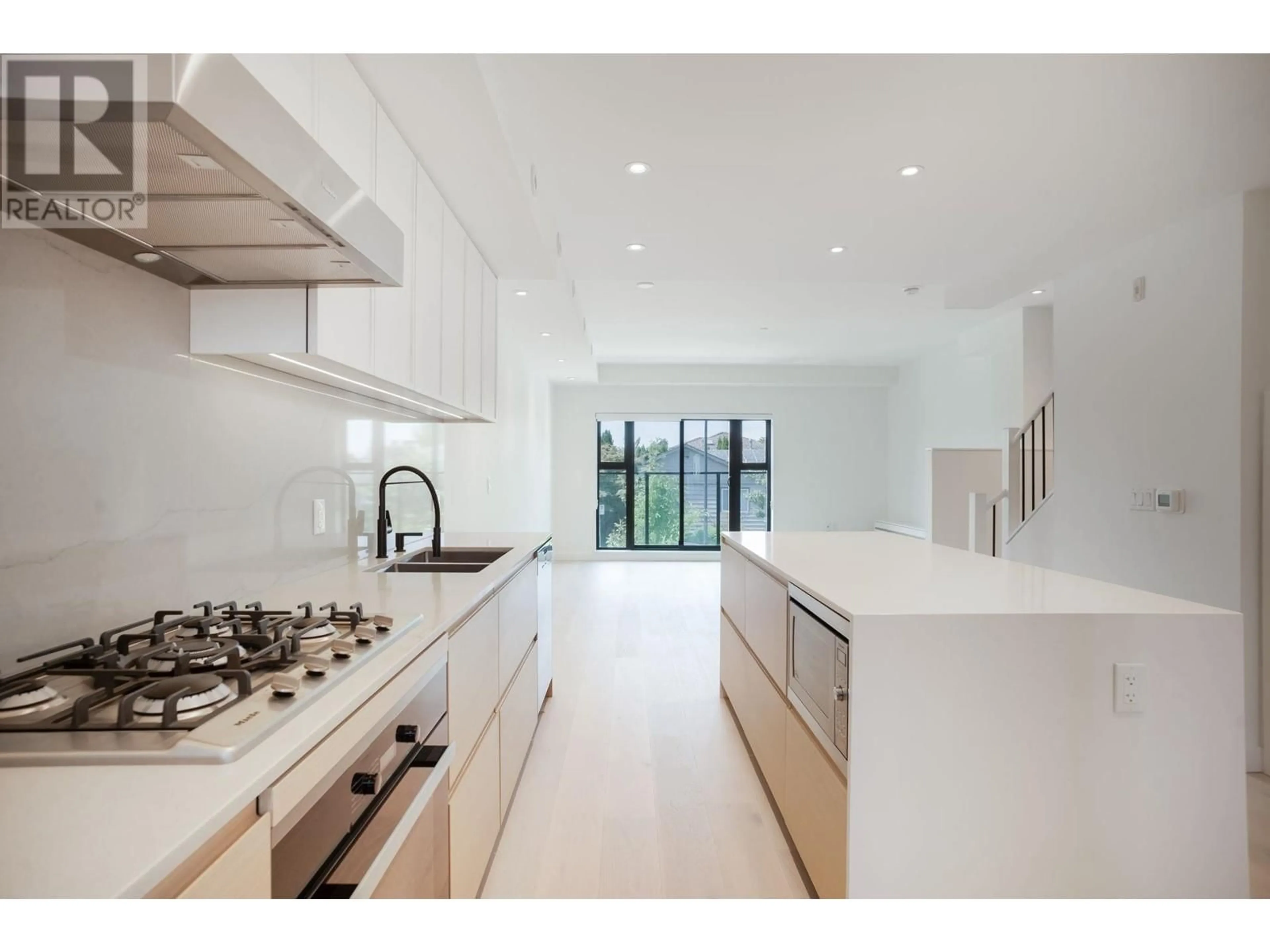 Contemporary kitchen, ceramic/tile floor for 586 28TH AVENUE, Vancouver British Columbia V5Z2H1