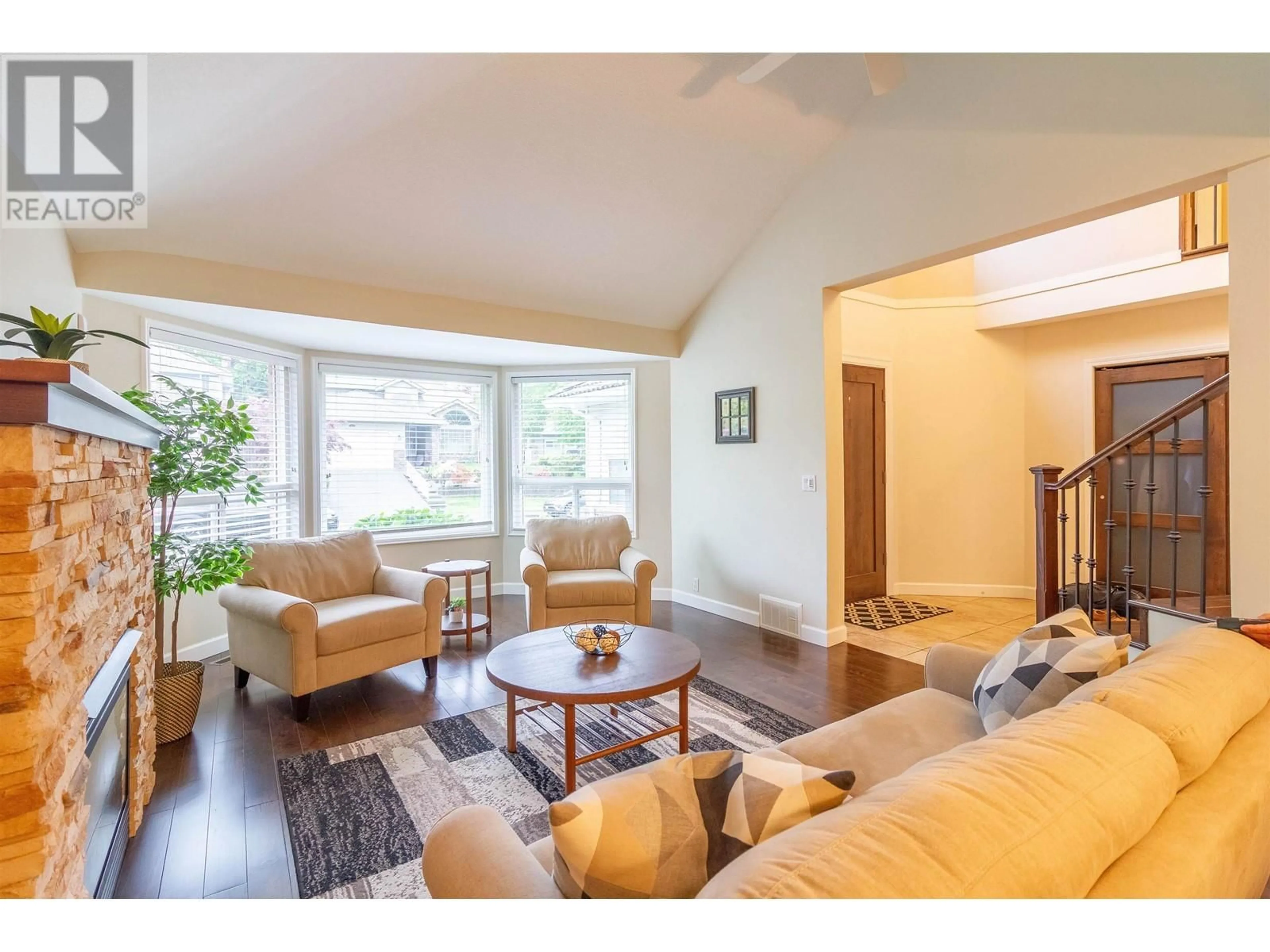 Living room with furniture, wood/laminate floor for 1872 WALNUT CRESCENT, Coquitlam British Columbia V3J7T1