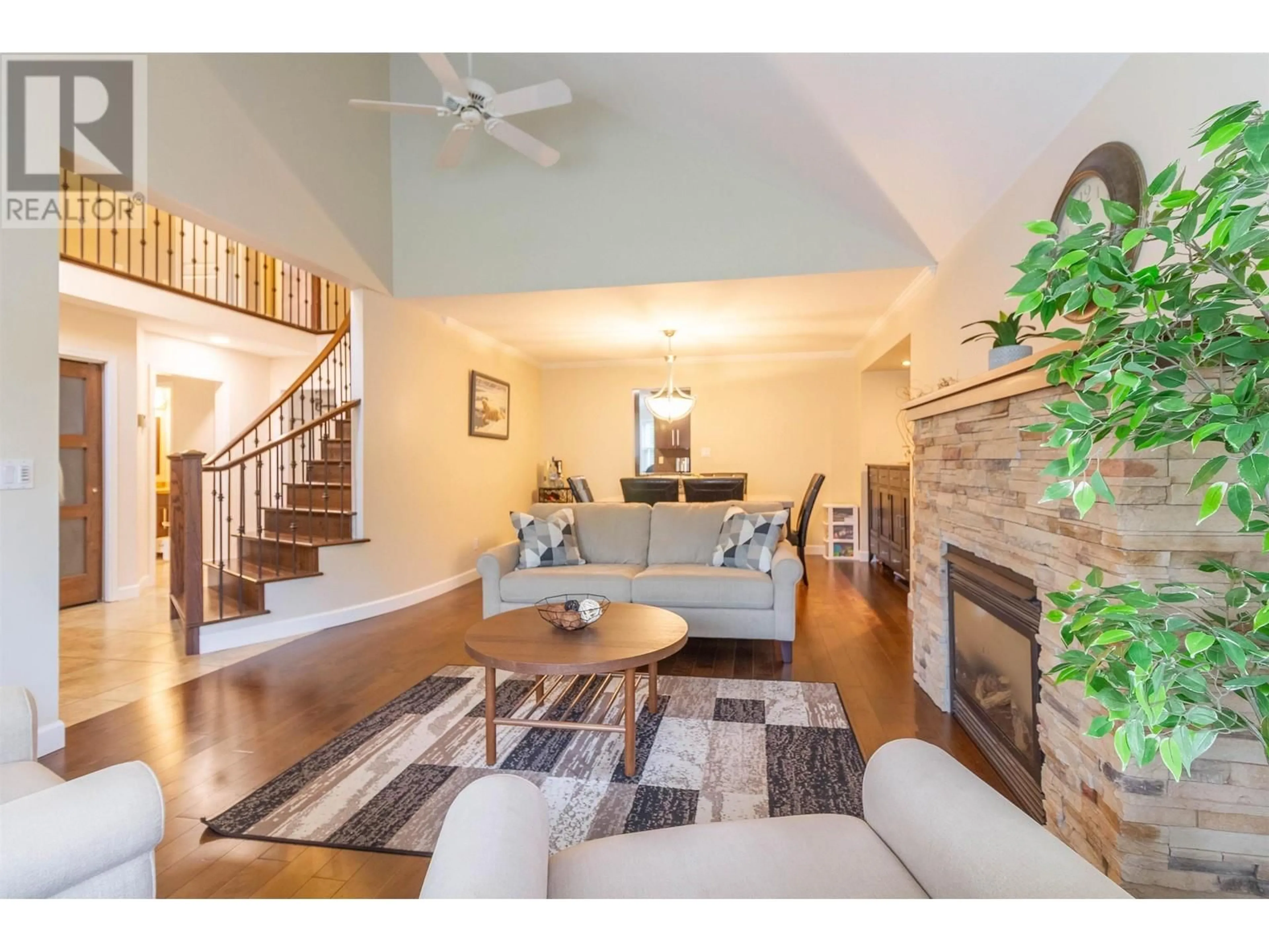 Living room with furniture, wood/laminate floor for 1872 WALNUT CRESCENT, Coquitlam British Columbia V3J7T1