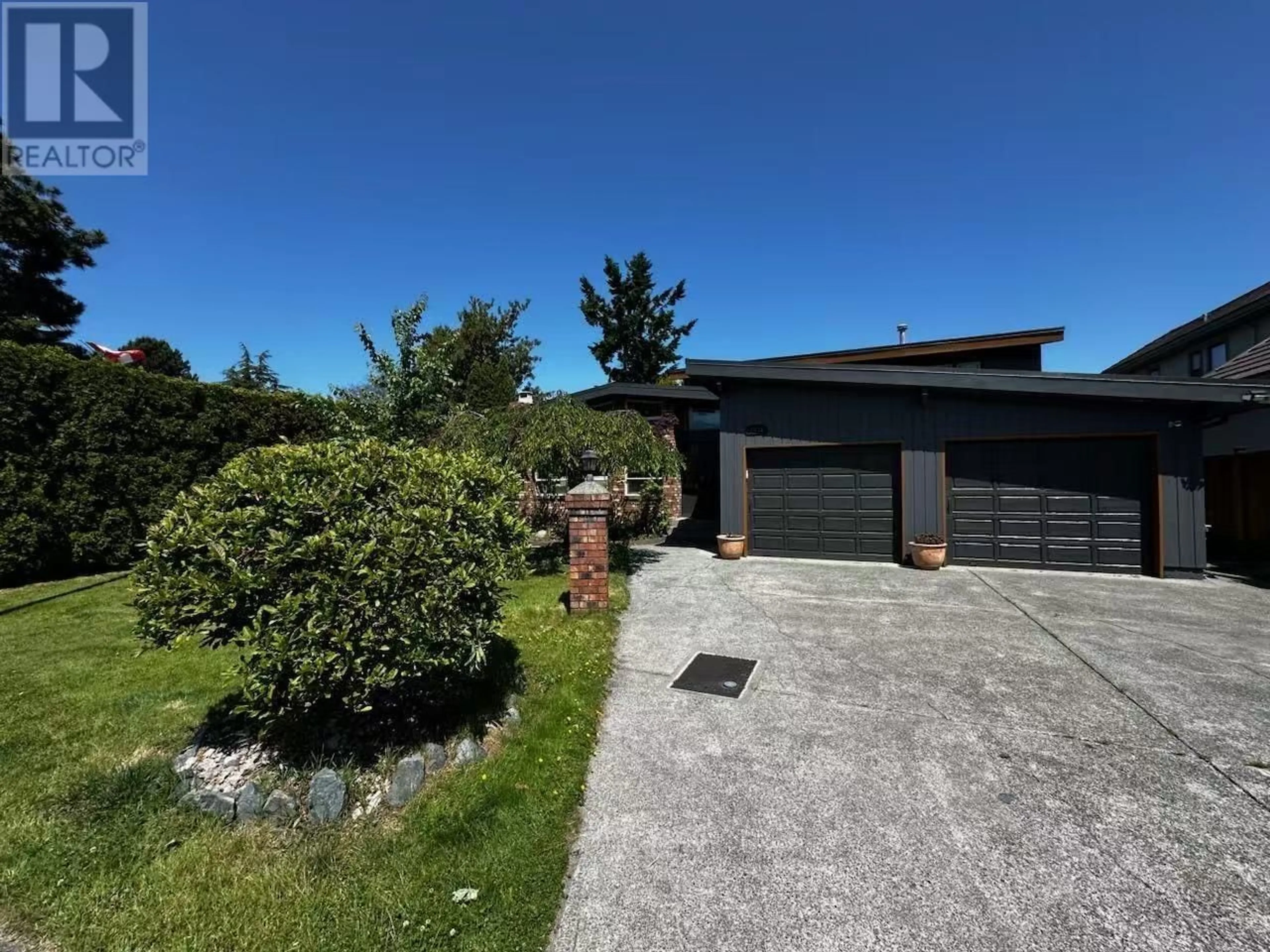 A pic from outside/outdoor area/front of a property/back of a property/a pic from drone, street for 4431 COLCHESTER DRIVE, Richmond British Columbia V7C4R3