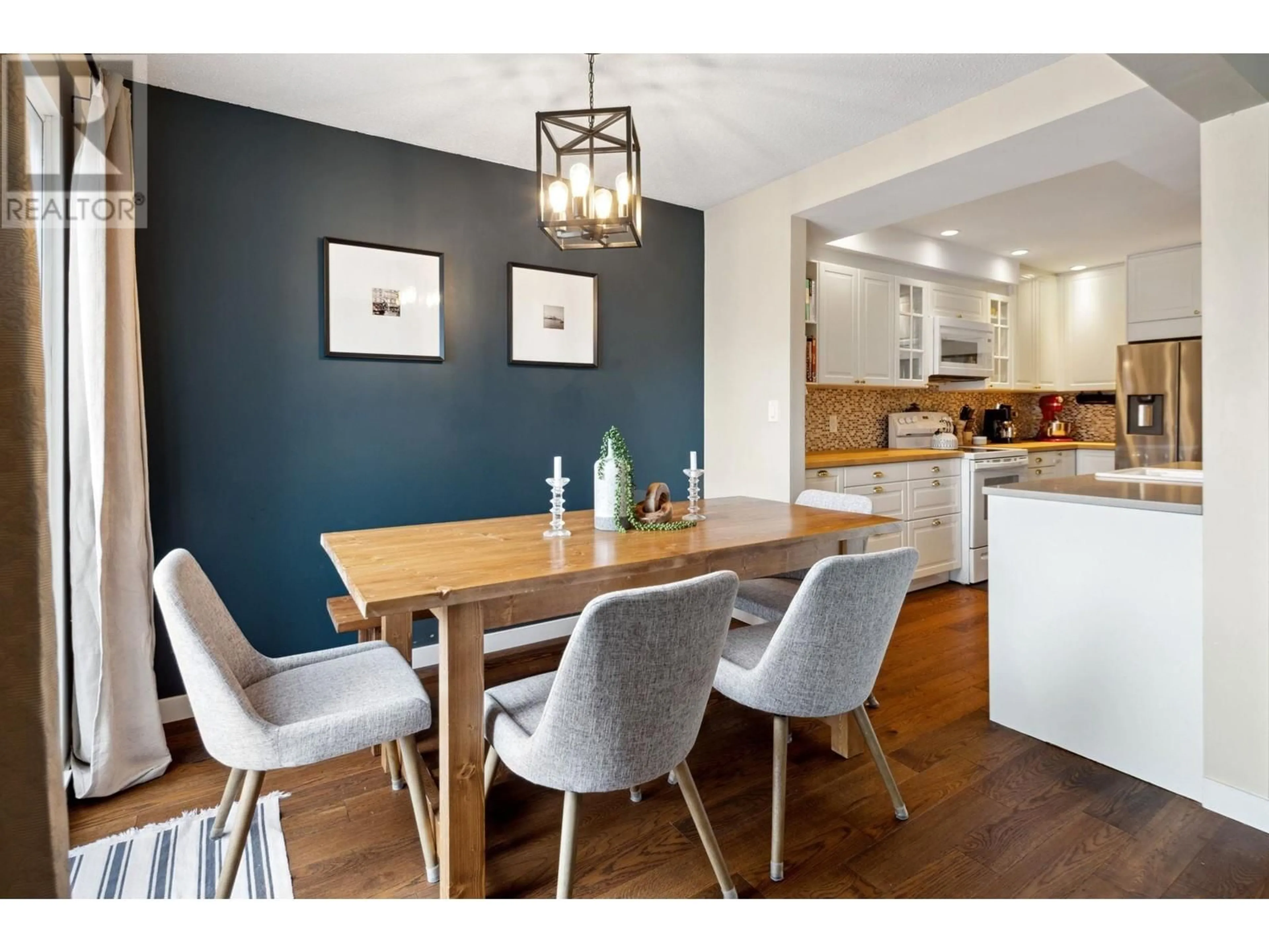 Open concept kitchen, wood/laminate floor for 10 - 4925 ELLIOTT STREET, Delta British Columbia V4K4L2
