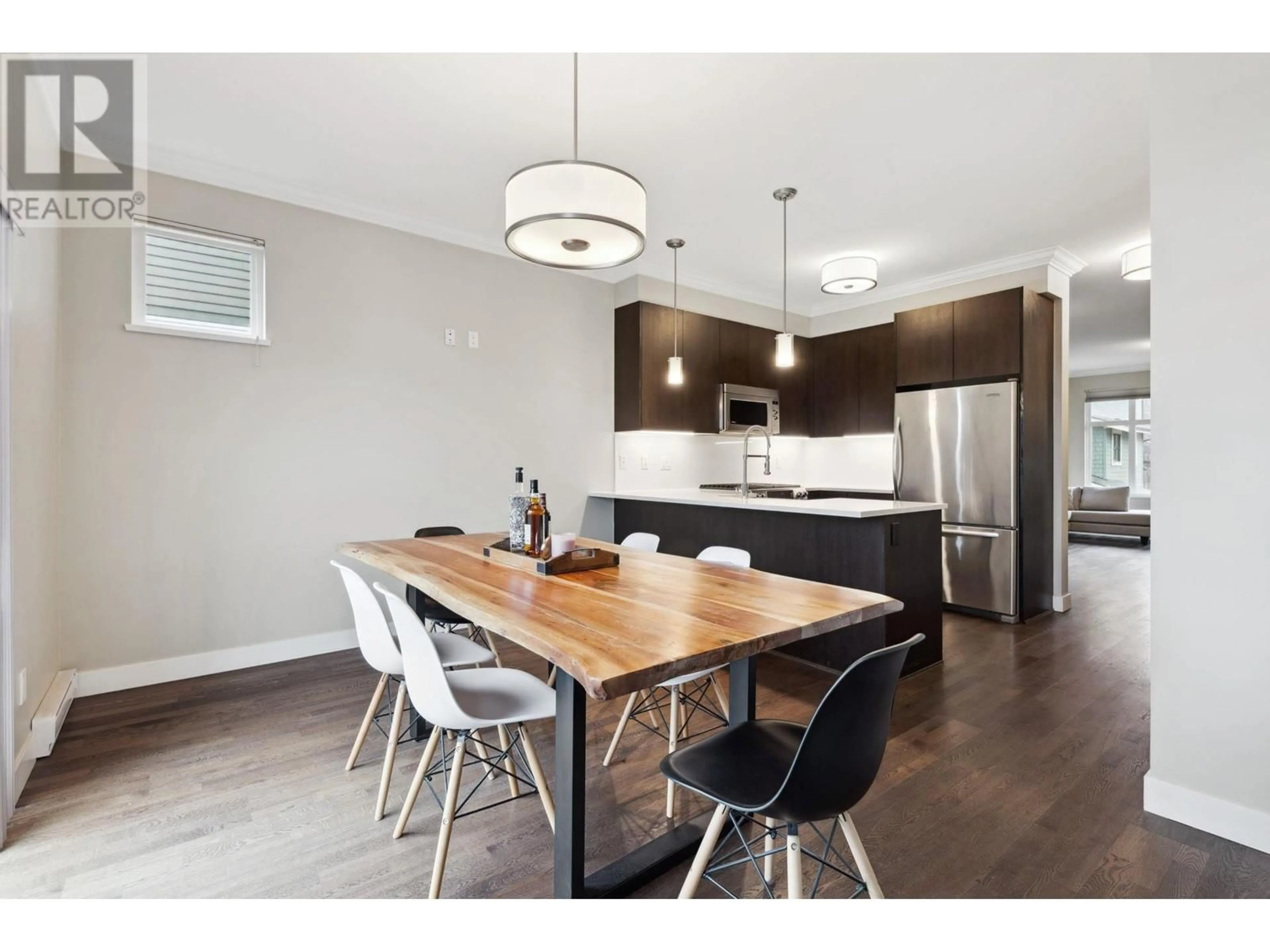 Open concept kitchen, wood/laminate floor for 1107 - 8485 NEW HAVEN CLOSE, Burnaby British Columbia V5J0B7