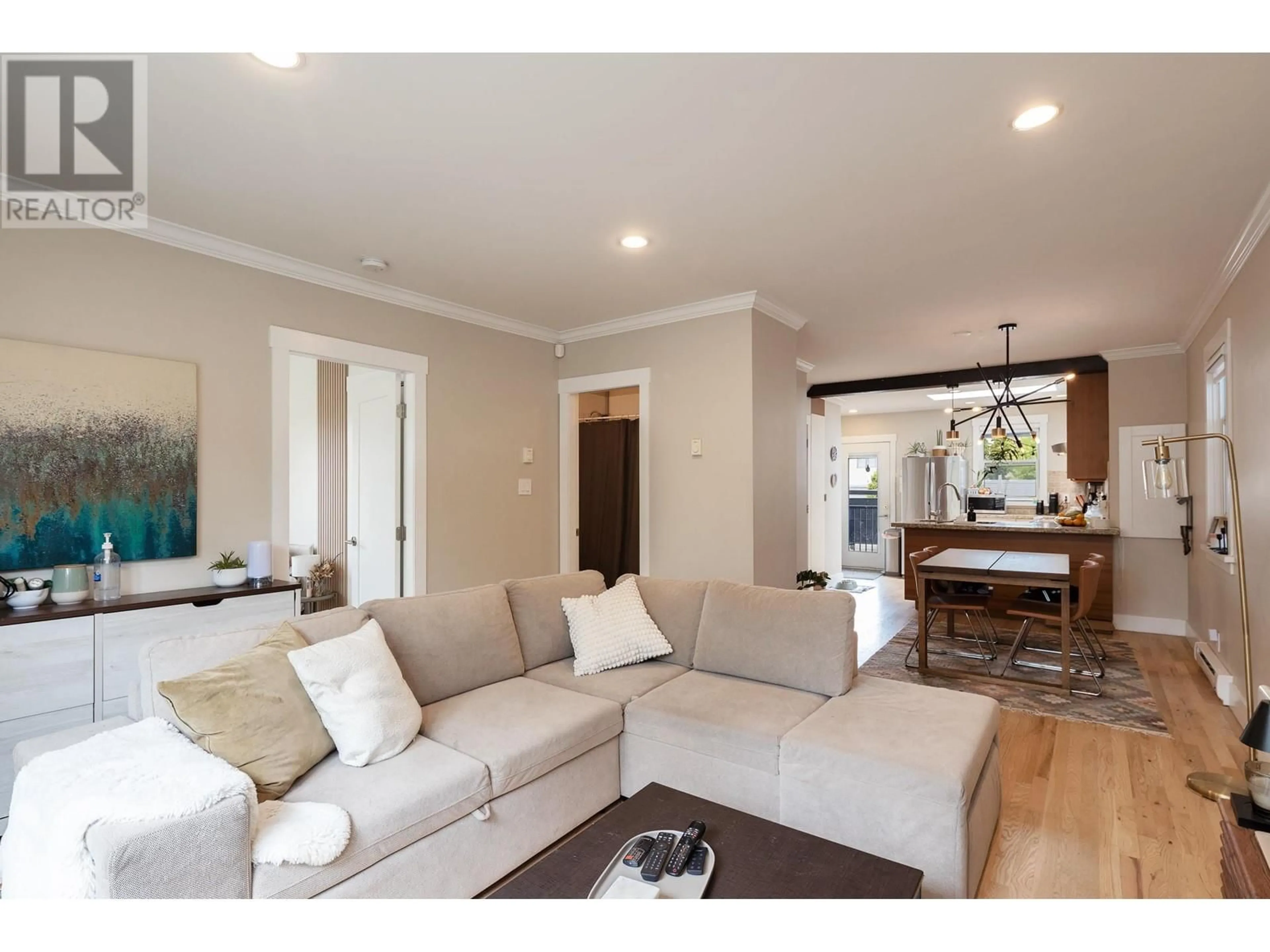 Living room with furniture, wood/laminate floor for 1617 36TH AVENUE, Vancouver British Columbia V5P1C3