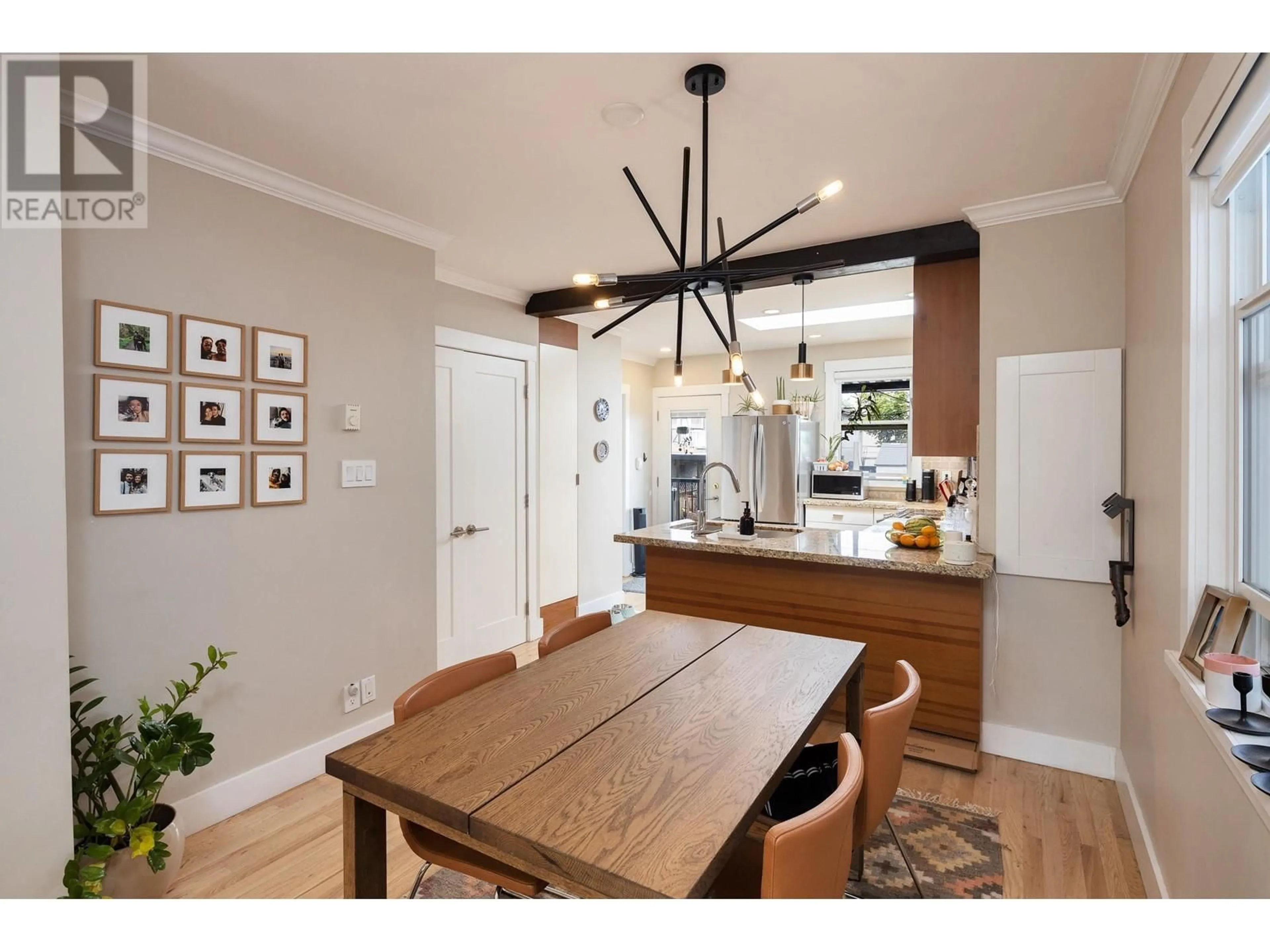 Open concept kitchen, wood/laminate floor for 1617 36TH AVENUE, Vancouver British Columbia V5P1C3